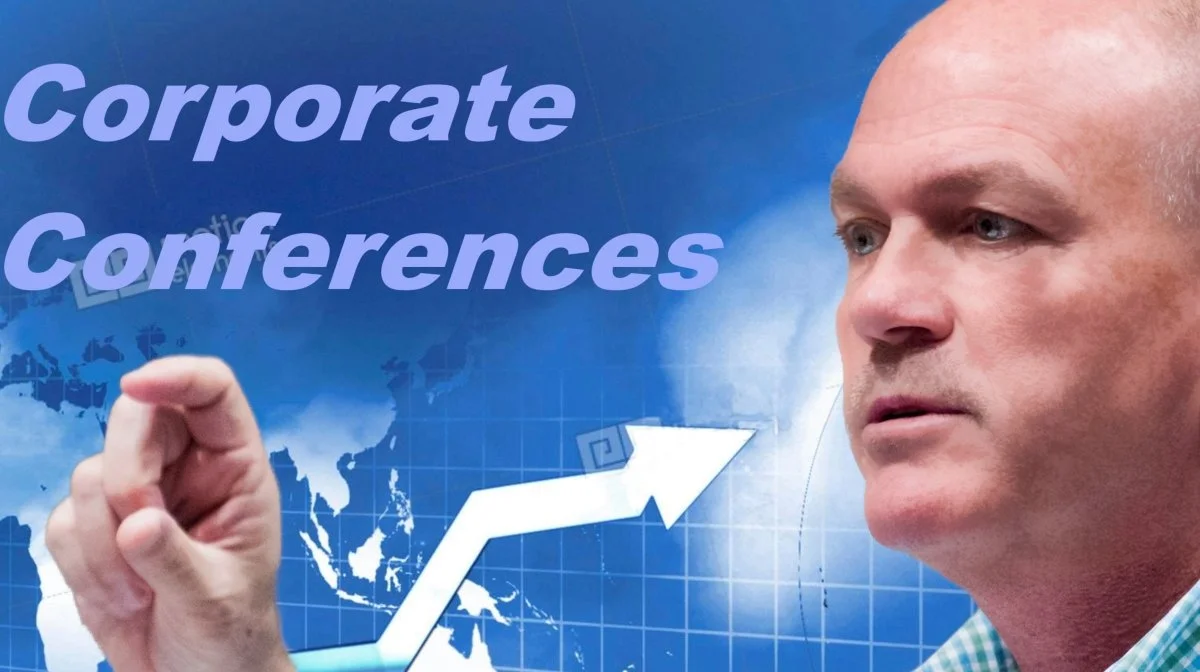 Man presenting on corporate conferences with a blue world map background and upward trending arrow.