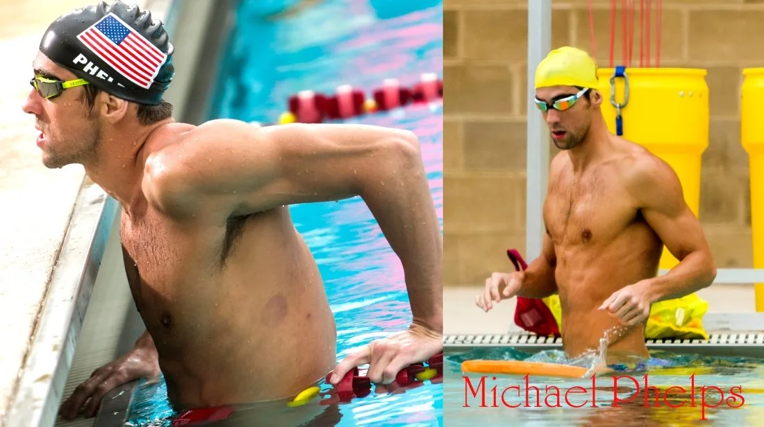 Two male swimmers preparing for a race at the pool, one in a black swim cap and goggles, and the other in a yellow swim cap and goggles, standing in the pool.