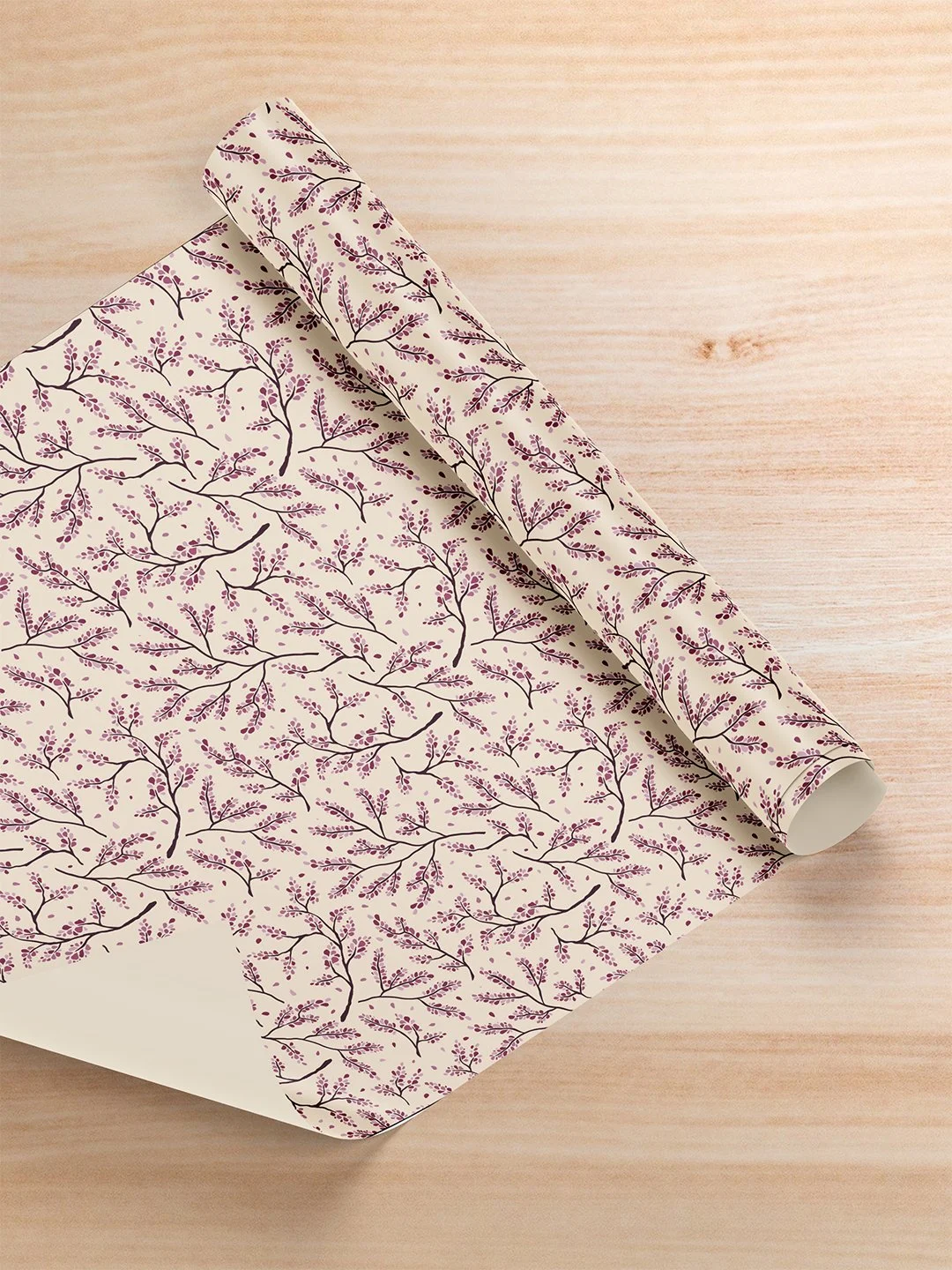 Breezy afternoon, a floral pattern mockup as wrapping paper by surface designer Julie McMillan of Silver Birch Studio.
