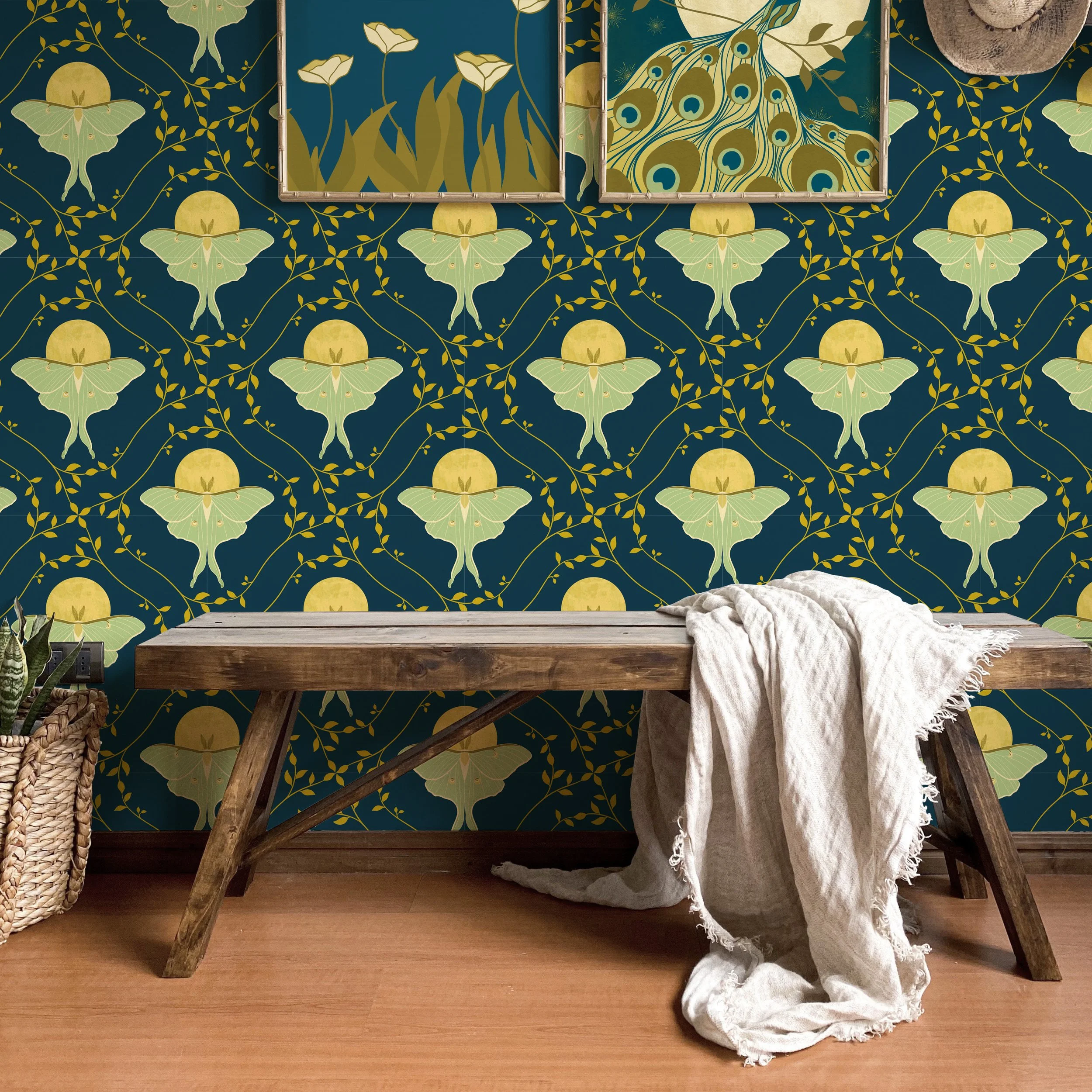 Mockup of a Luna moth wallpaper by surface designer Julie McMillan of Silver Birch Studio, part of the Magic in the Moonlight collection.