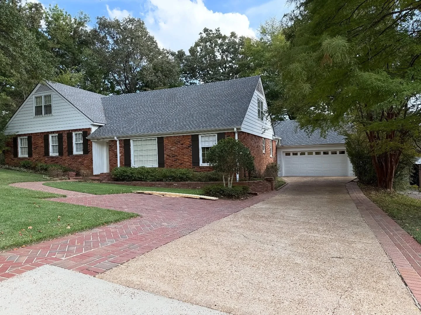 We converted the original carport on this house into a beautiful garage that blends seamlessly with the home. Call Malone Homes today for a free estimate!