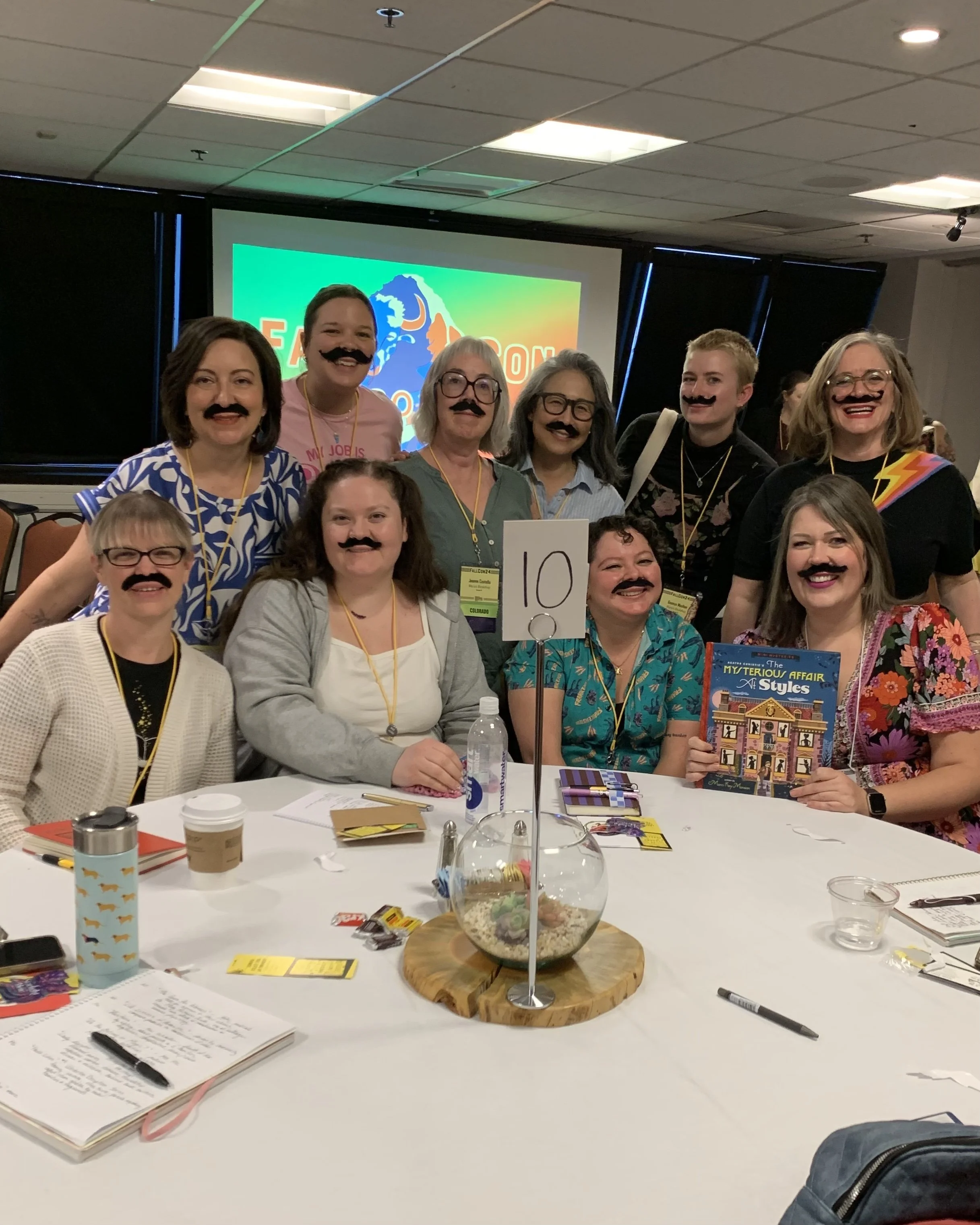 Booksellers at MPIBA dedicated to the 'stache