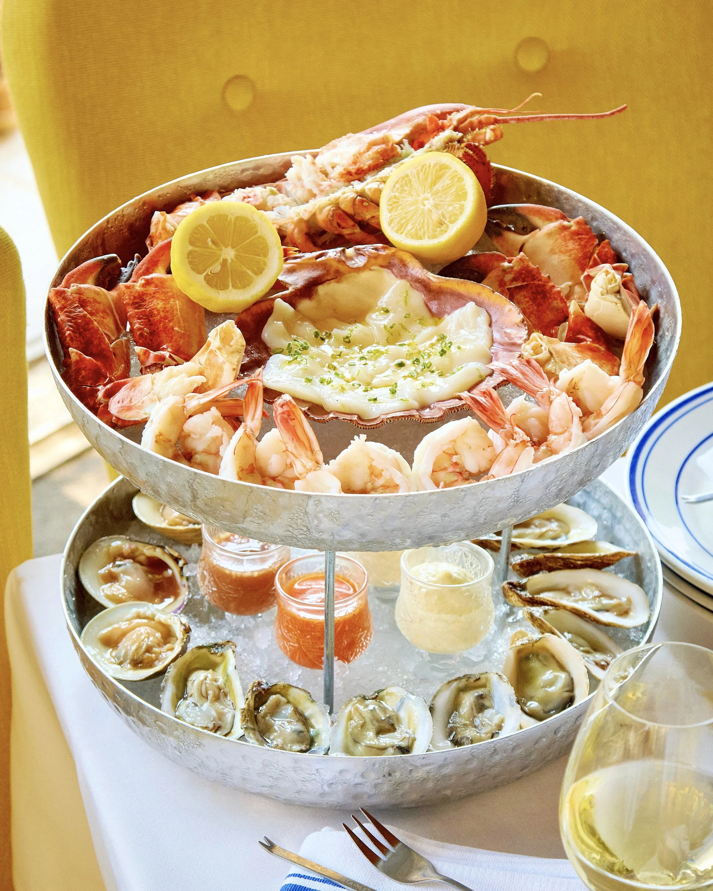Seafood Tower with Poached Shrimp, Lobster, Stone Crab Claws, Raw Scallops, Oysters, and Clams