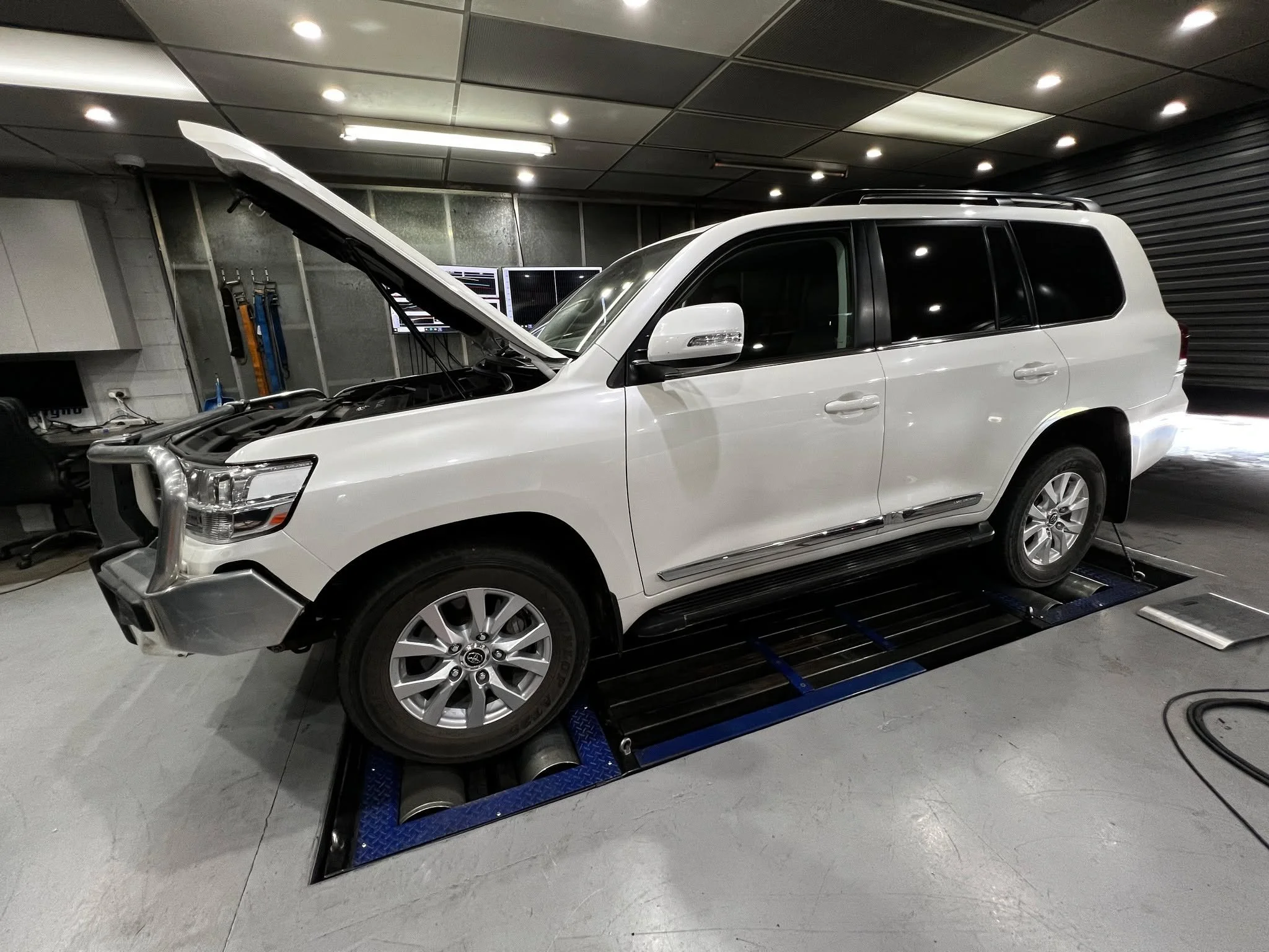 200 Series Landcruiser getting some mods. This vehicle had a full exhaust, air box and custom engine and transmission calibration to get the best for both towing and touring.  For all your tuning needs and performance upgrades, contact the sales team
