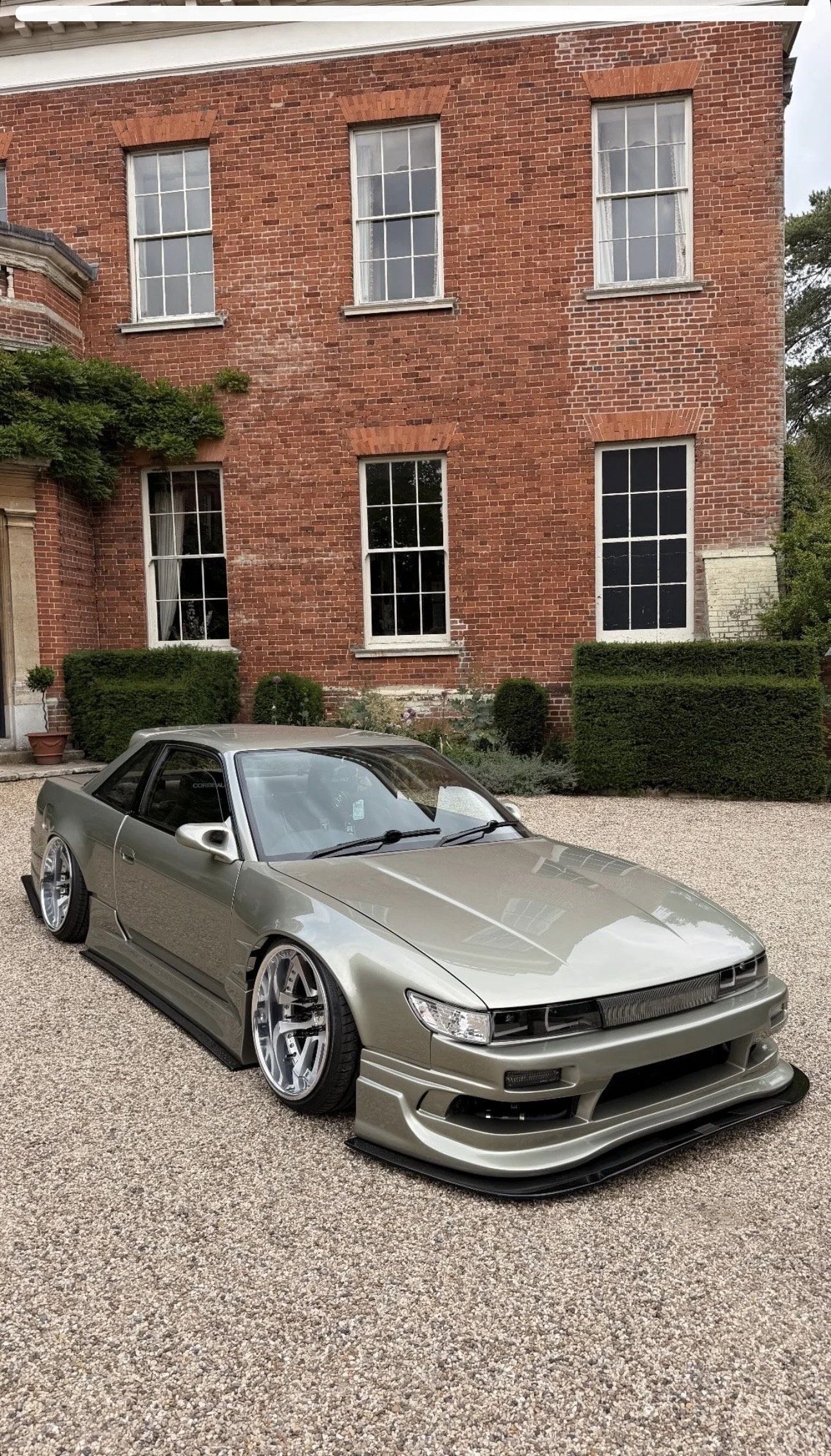 modified jdm widebody Nissan S13 sprayed in millennium jade at concours classics