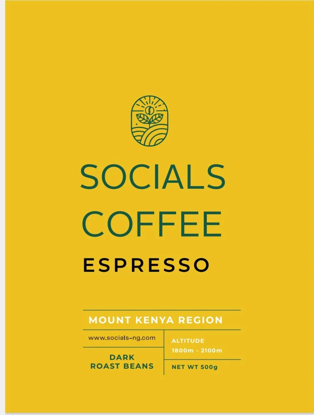 Package of Socials Coffee on a wooden shelf with decorative items in the background.