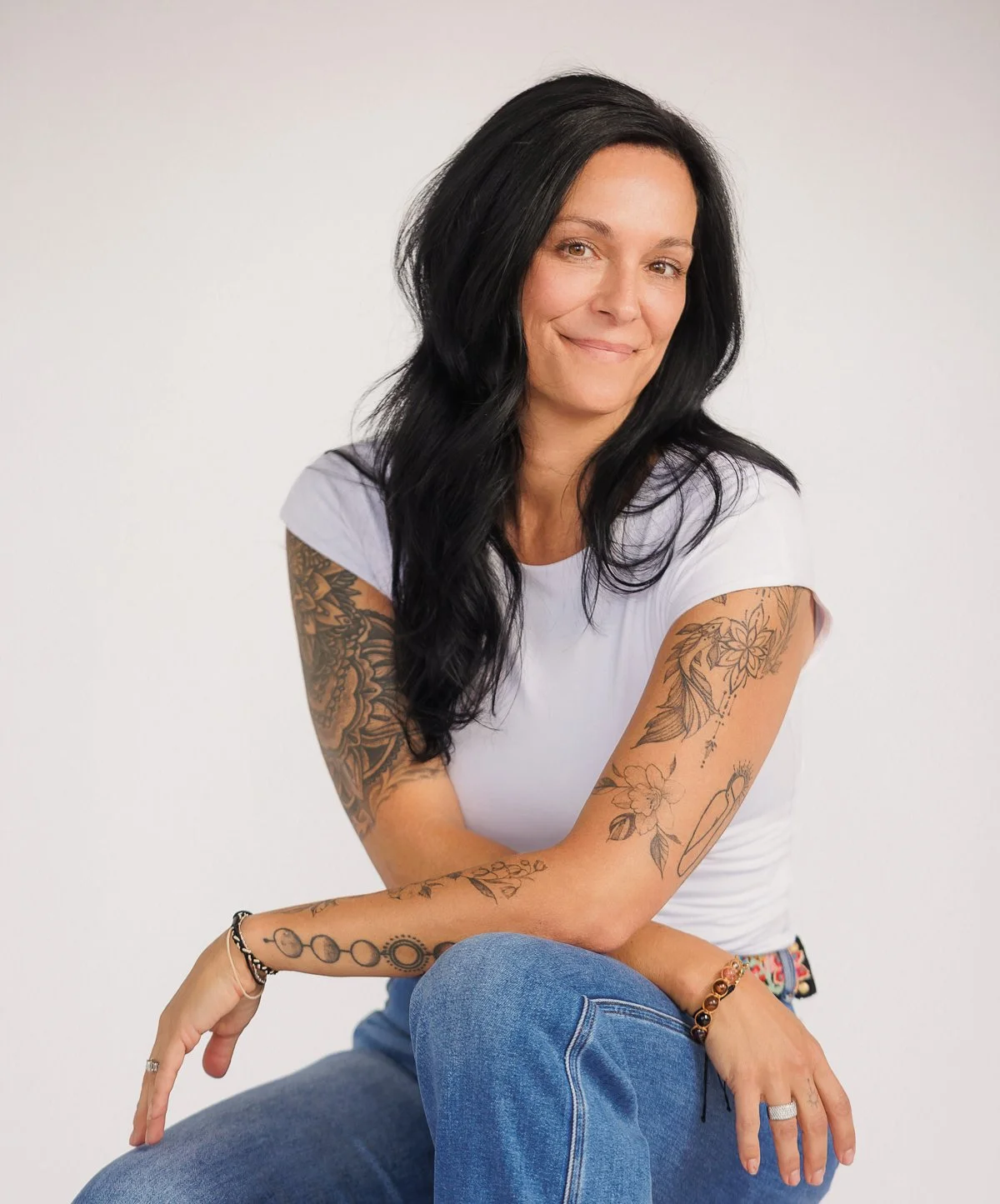 Portrait of Lindsey Johnston, founder of The Fire Within Yoga, providing women's wellness coaching for perimenopause, menopause, hormone health, nutrition, movement, and lifestyle support.