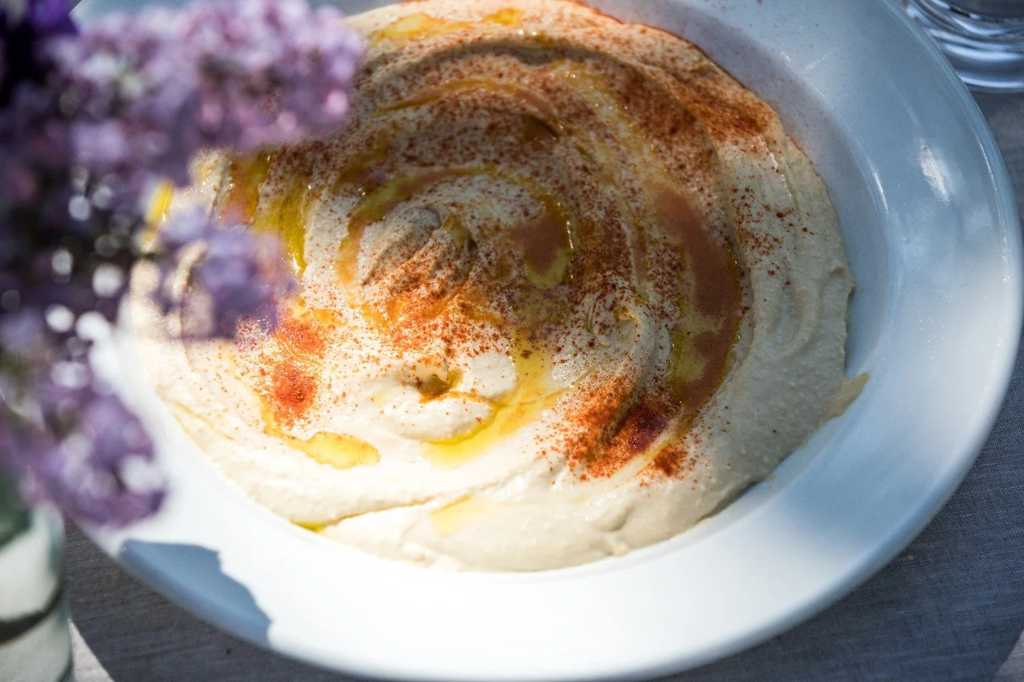 Hummus flavorful can be eaten with canapes and graing boards or as a dip/sauce with meats and mains.
Image @corrinatoughphotograpy #lebanesemezze#foodmadetoorder#freshfood#handmadefood#dips#grilled veg#falafel#chickenskewers