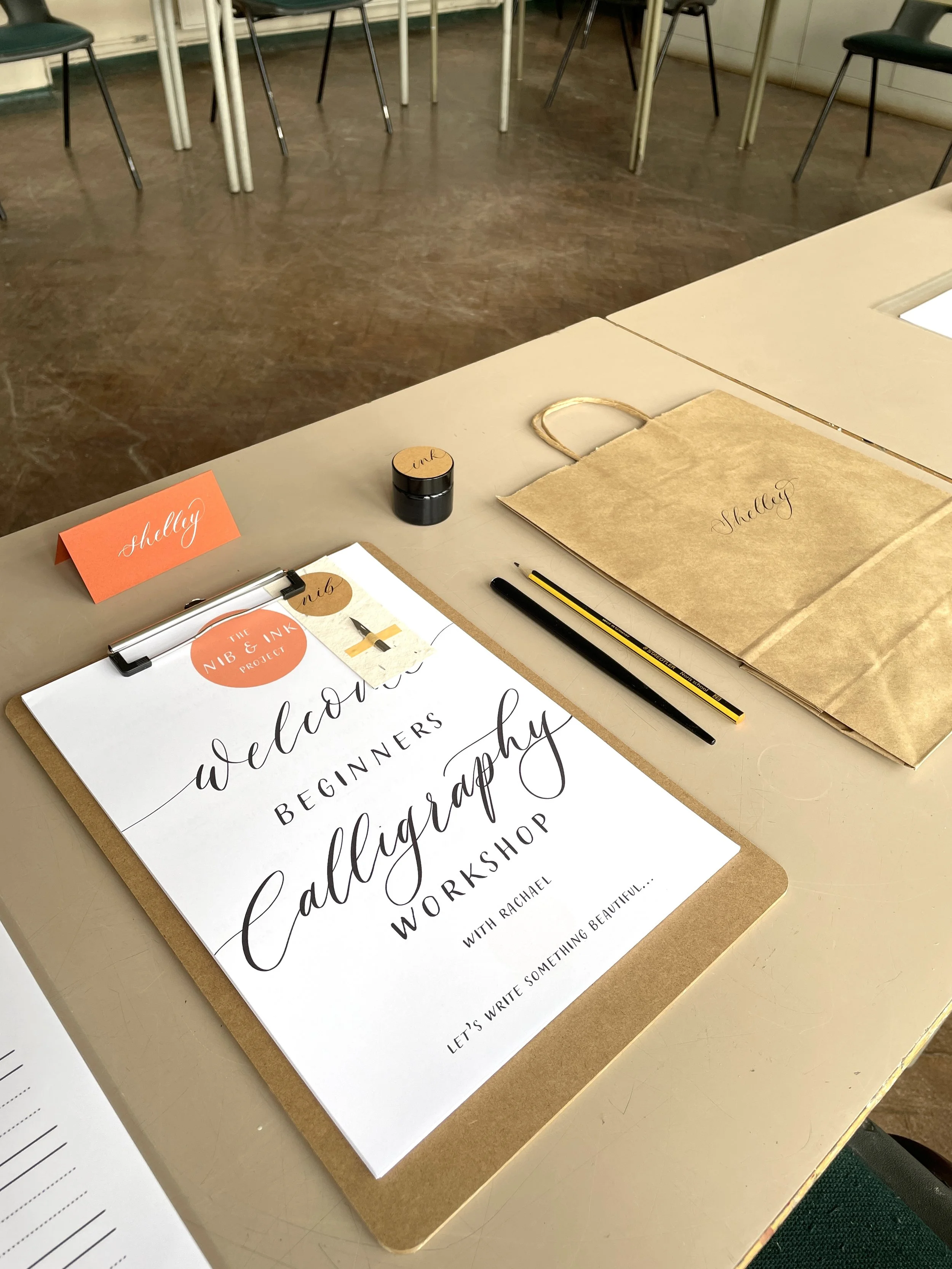 Image of workshop set-up including calligraphy kit