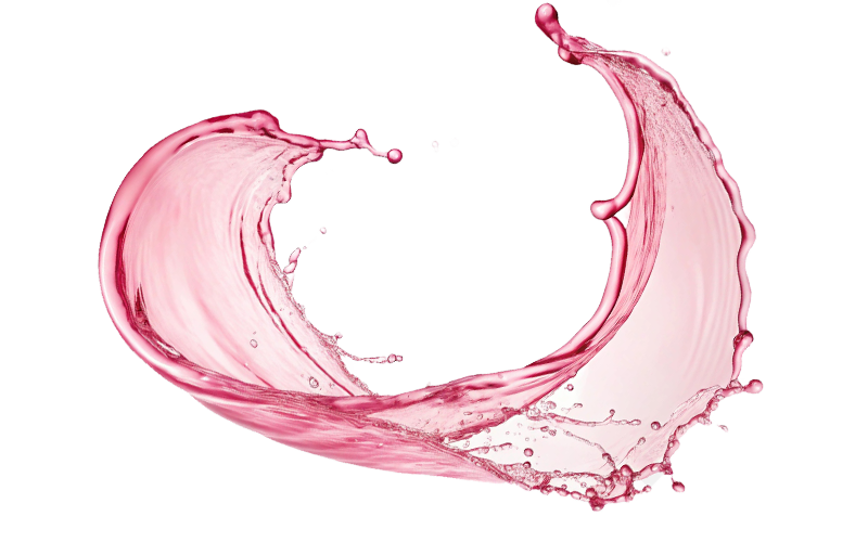 A splash of pink liquid forming a semi-circle against a black background.