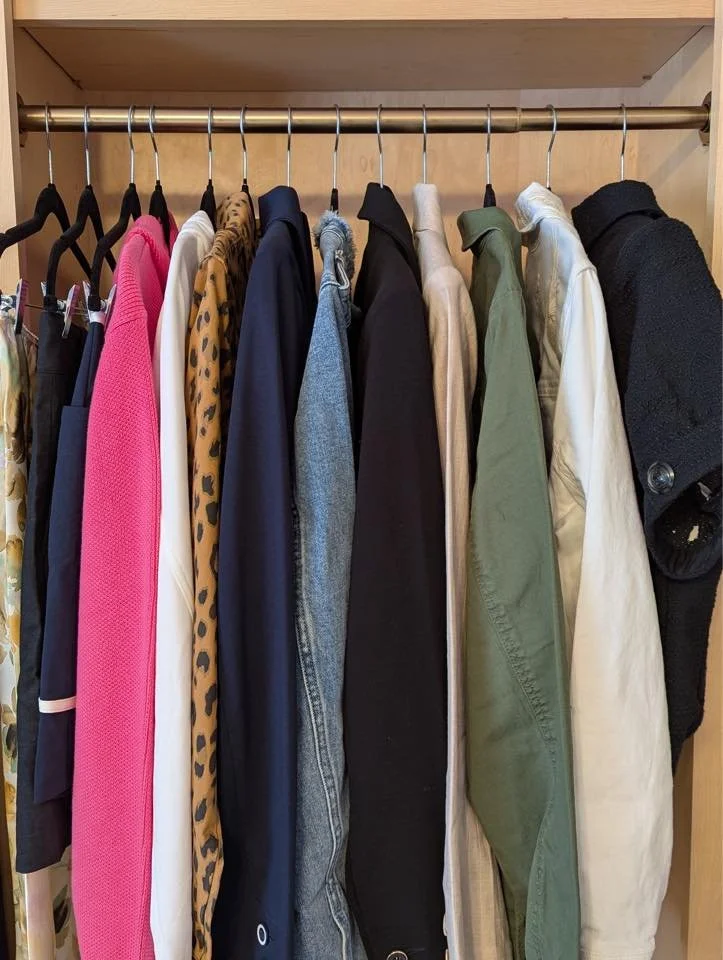 stylish clothing hung on rack