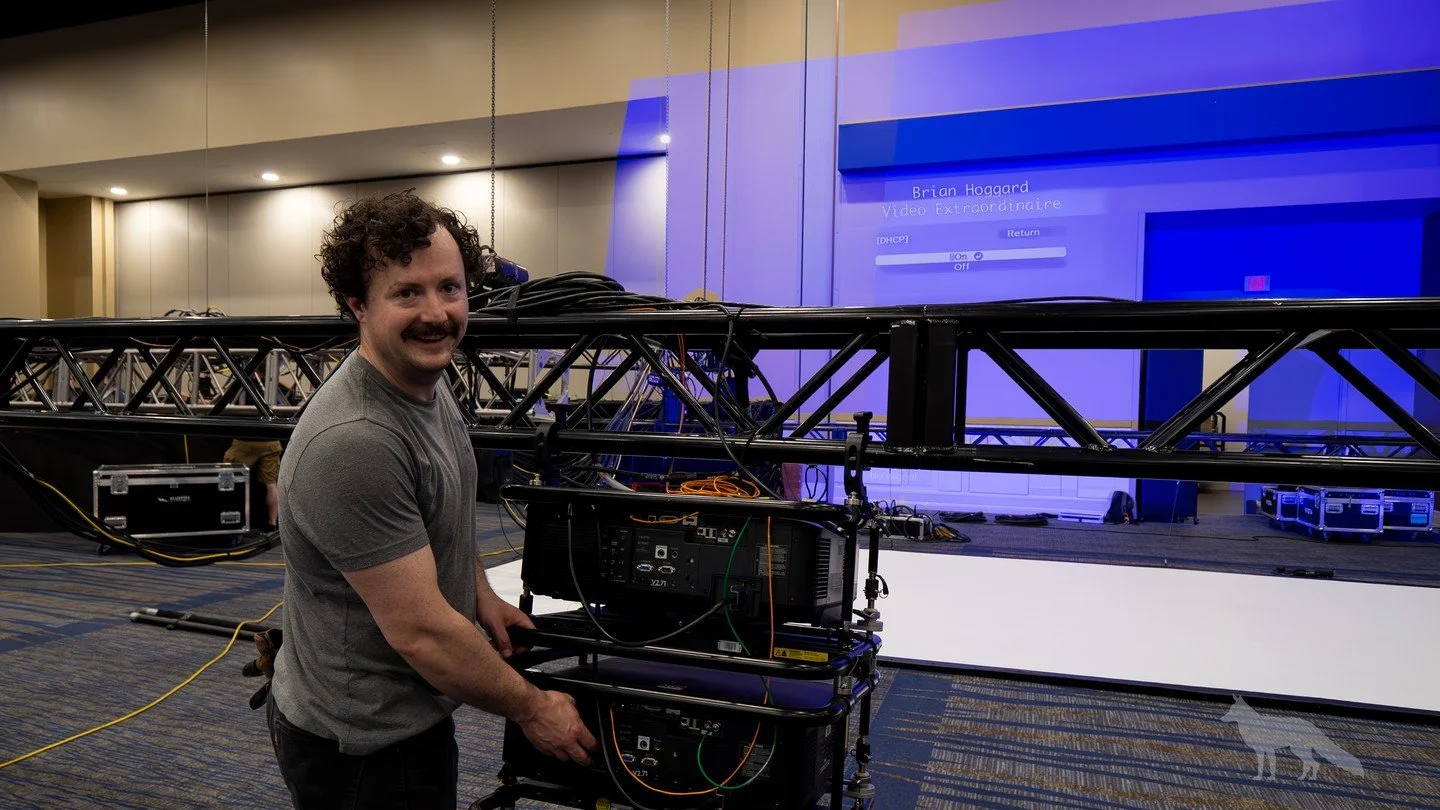 Happy work anniversary to Brian Hoggard, Sr Engineer and leader of our video crew. From clean signal paths to sharp content and perfectly timed playback, Brian keeps everything moving behind the scenes. Clients trust him, the team leans on him, and y
