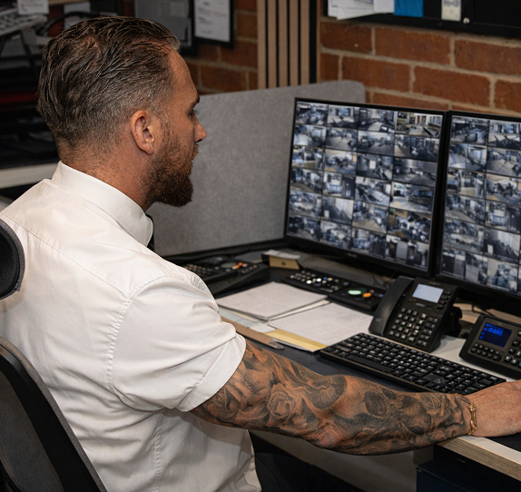 CCTV operator monitoring security systems in Blackpool control room