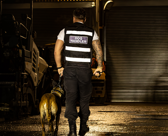 Security patrol with guard dog at industrial site in Blackpool