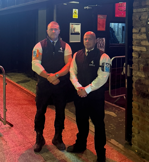 Event security team managing entrance and crowd safety in Oxford