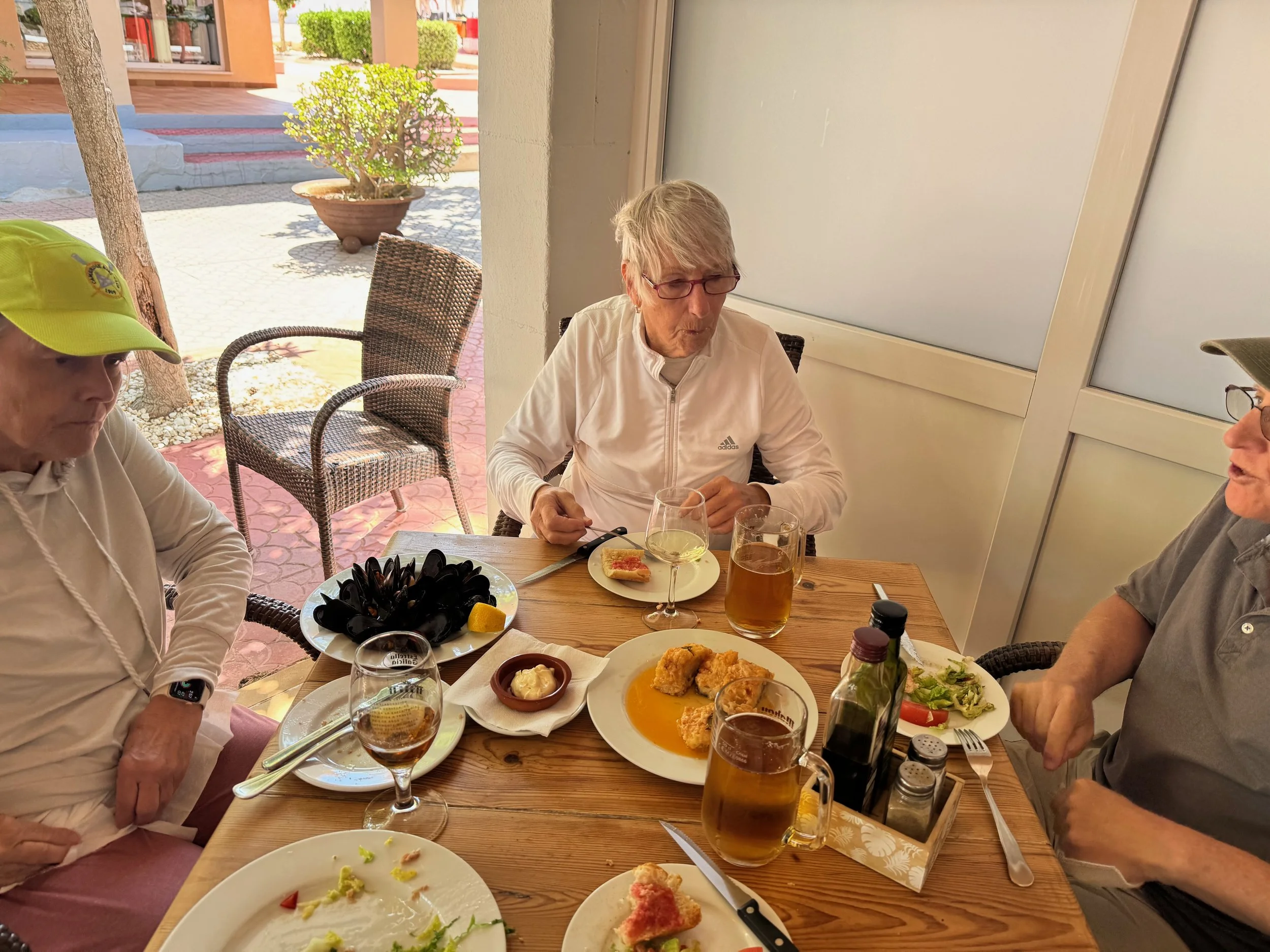 Hallie, Mary Ann, and Bob enjoy a tapas lunch.