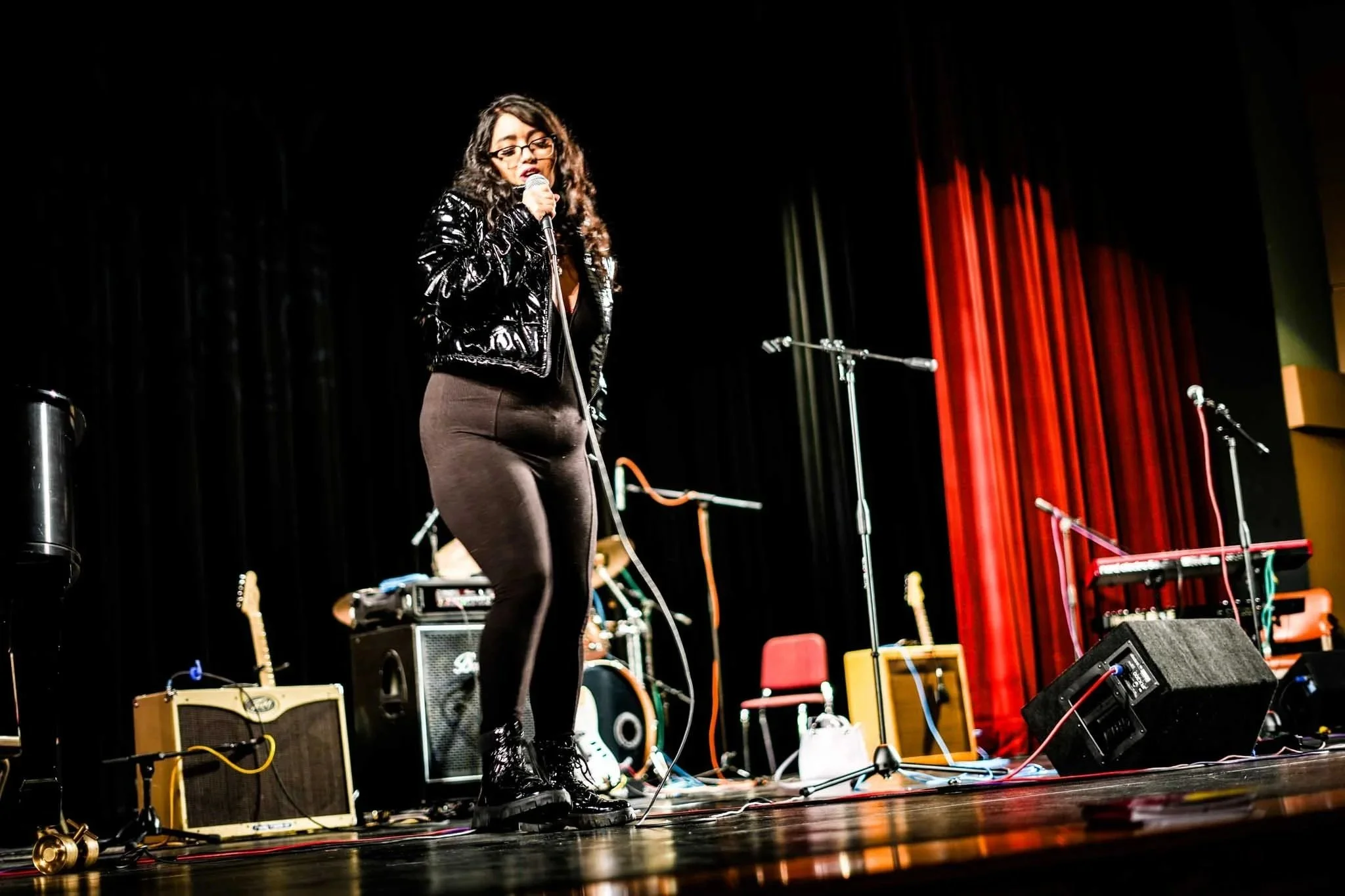 Live sound production for a concert performance on an indoor stage