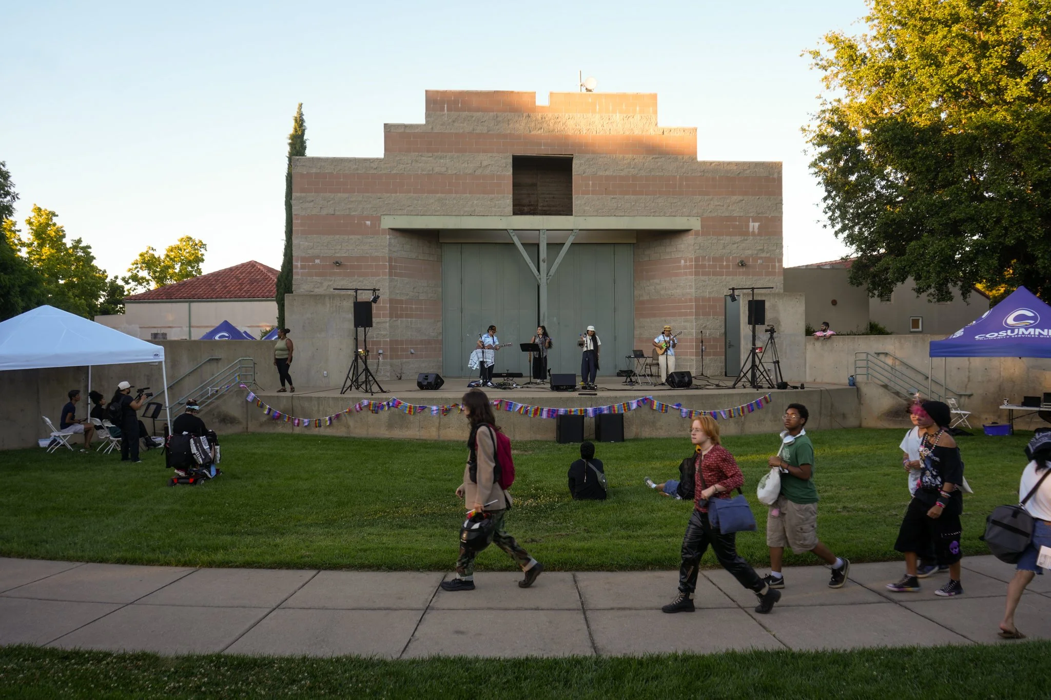 Wide view of an outdoor community festival featuring professional live sound rental, PA speakers, and event audio production in Sacramento.
