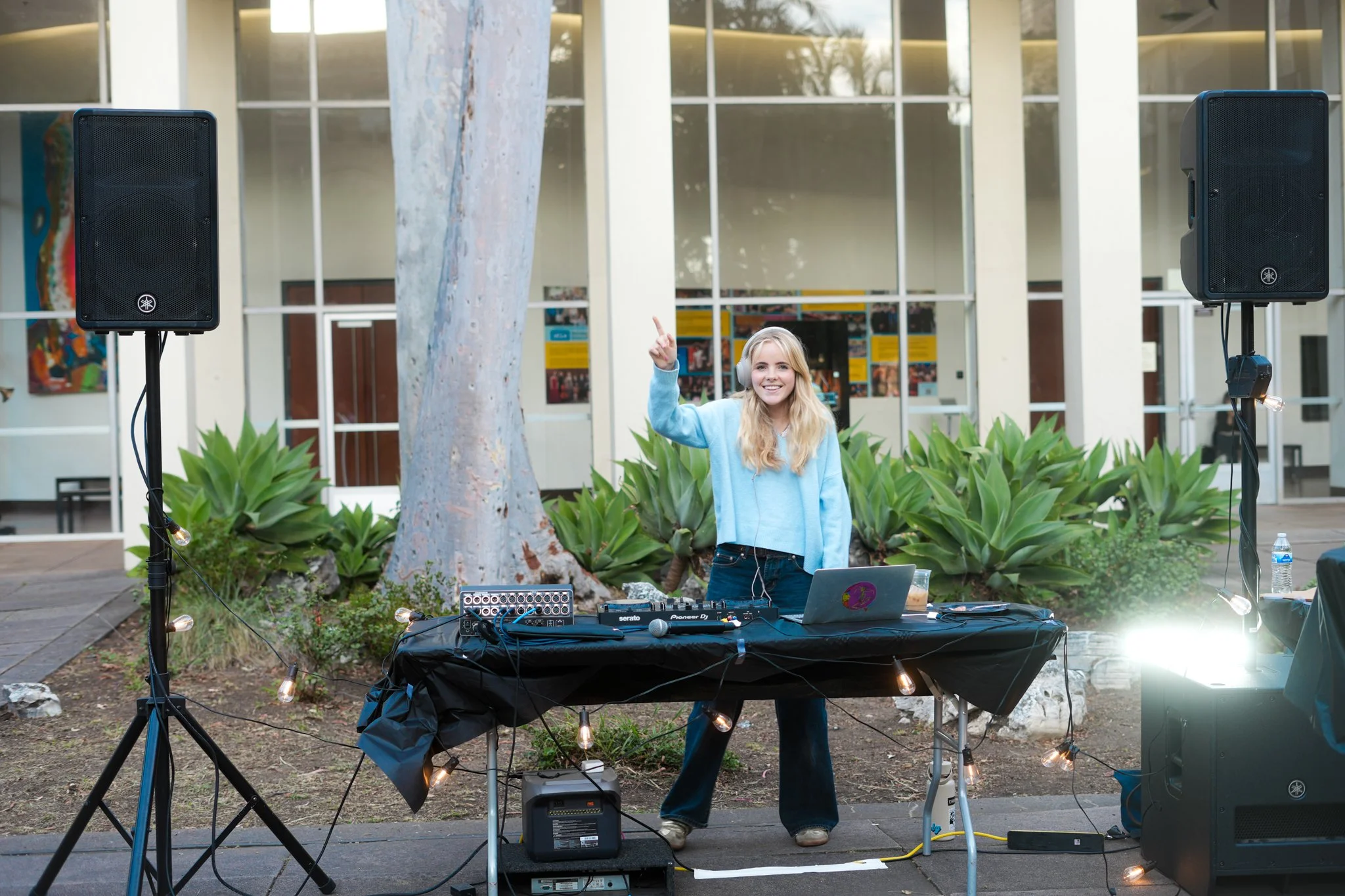 Professional DJ setup with PA speakers and live sound equipment providing music and event audio for a Sacramento corporate networking event.