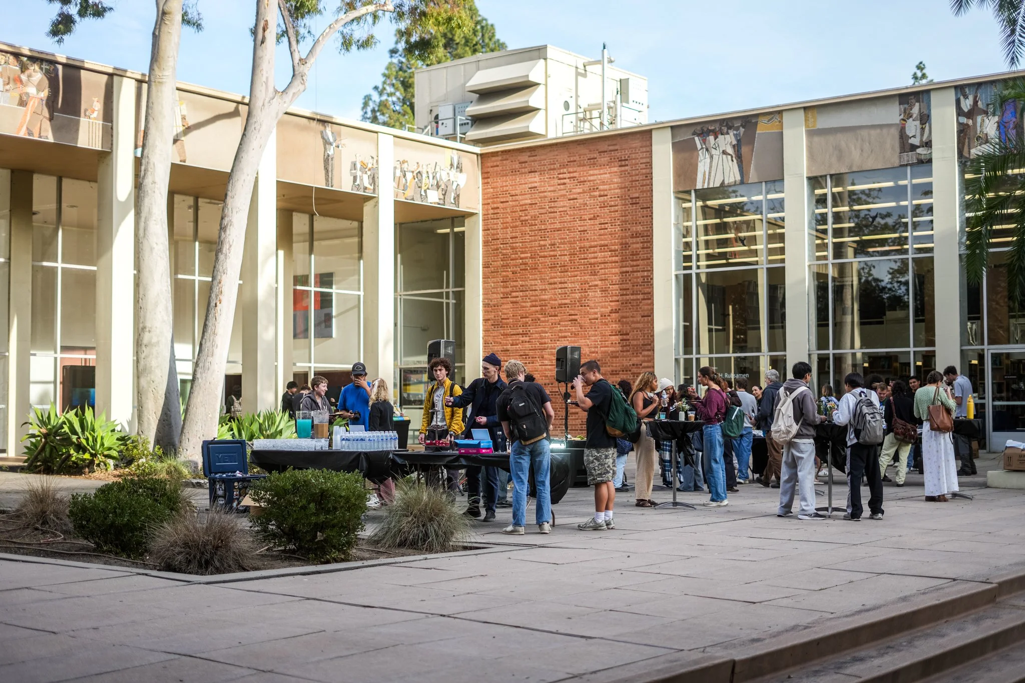 Professional live sound rental setup for a university networking event in Sacramento featuring PA speakers, DJ equipment, and event audio production.