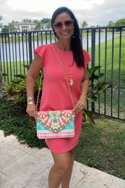 https://shopcuratedcloset.com/wp-content/uploads/2022/03/rising-sun-clutch-5.jpg