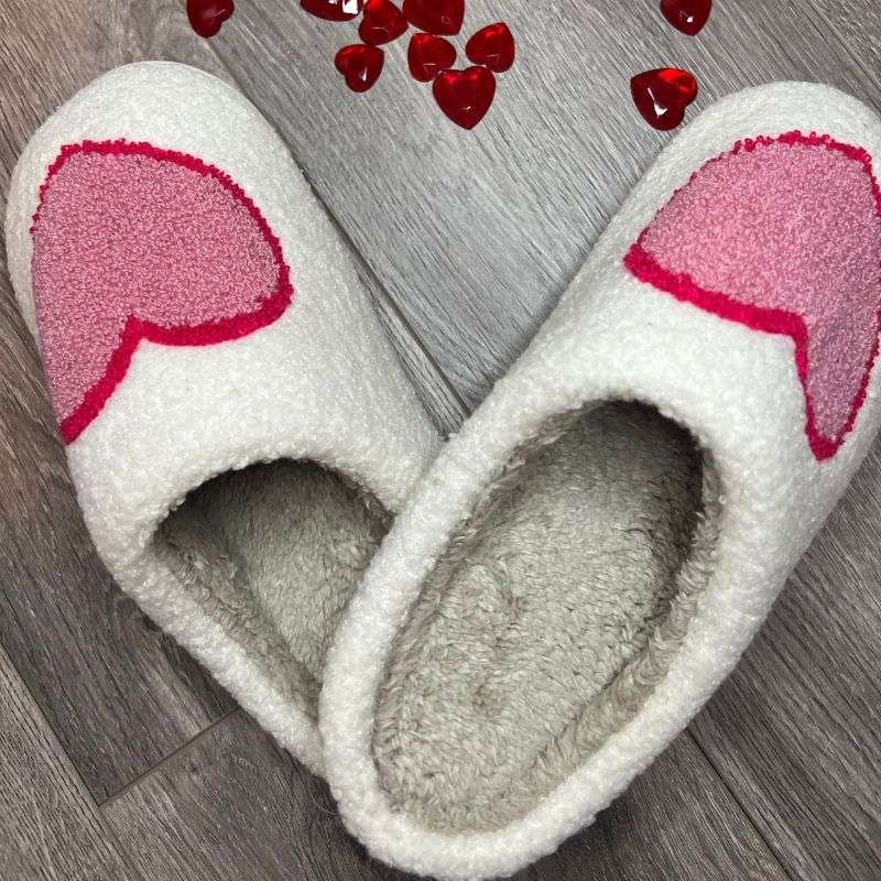 https://shopcuratedcloset.com/wp-content/uploads/2024/01/big-heart-slippers-feature.jpg