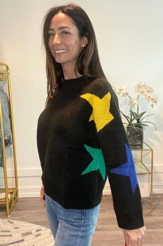 https://shopcuratedcloset.com/wp-content/uploads/2024/01/star-light-sweater-2.jpg
