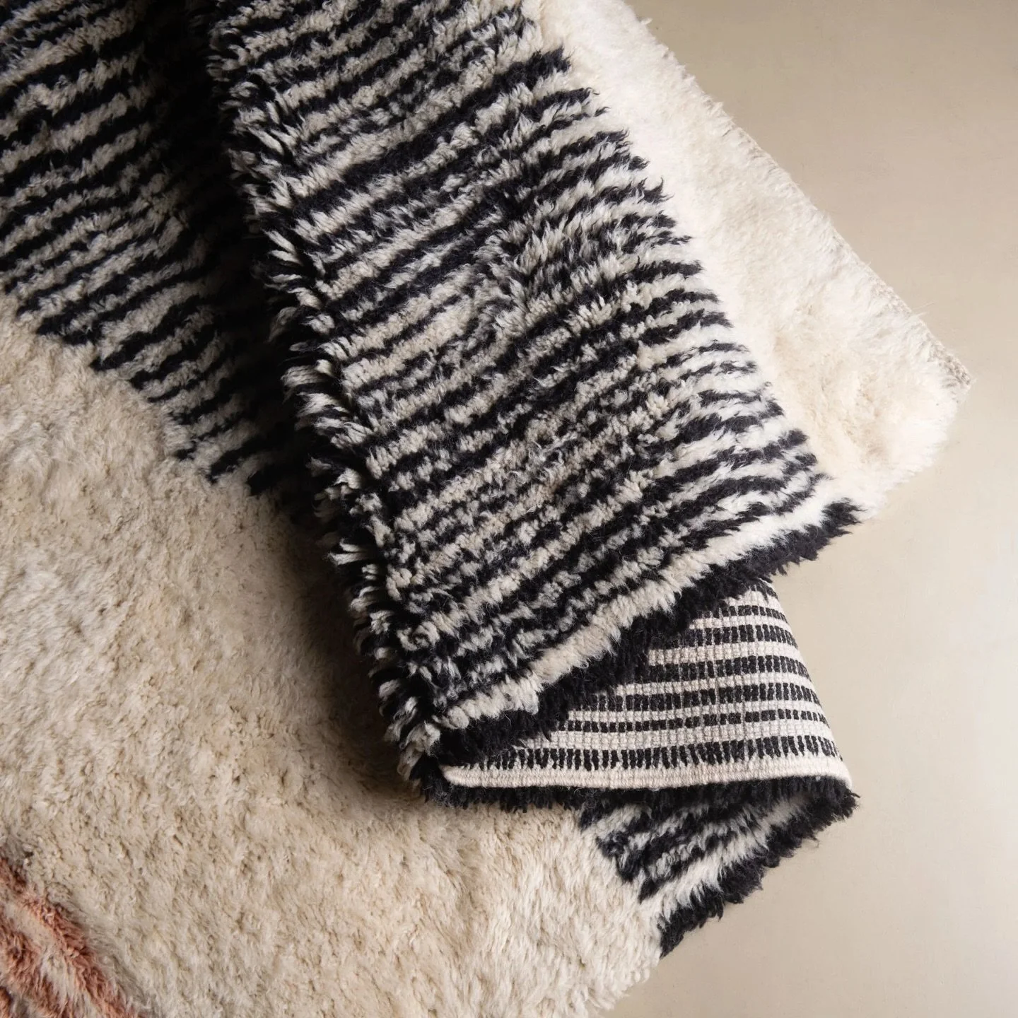 At AphroChic we define luxury home decor as sustainable, artisan, regenerative, and community-driven. And that&rsquo;s what you&rsquo;ll find with our hand-loomed Moroccan rugs. Each rug is made by a community of women in the Atlas Mountains who have