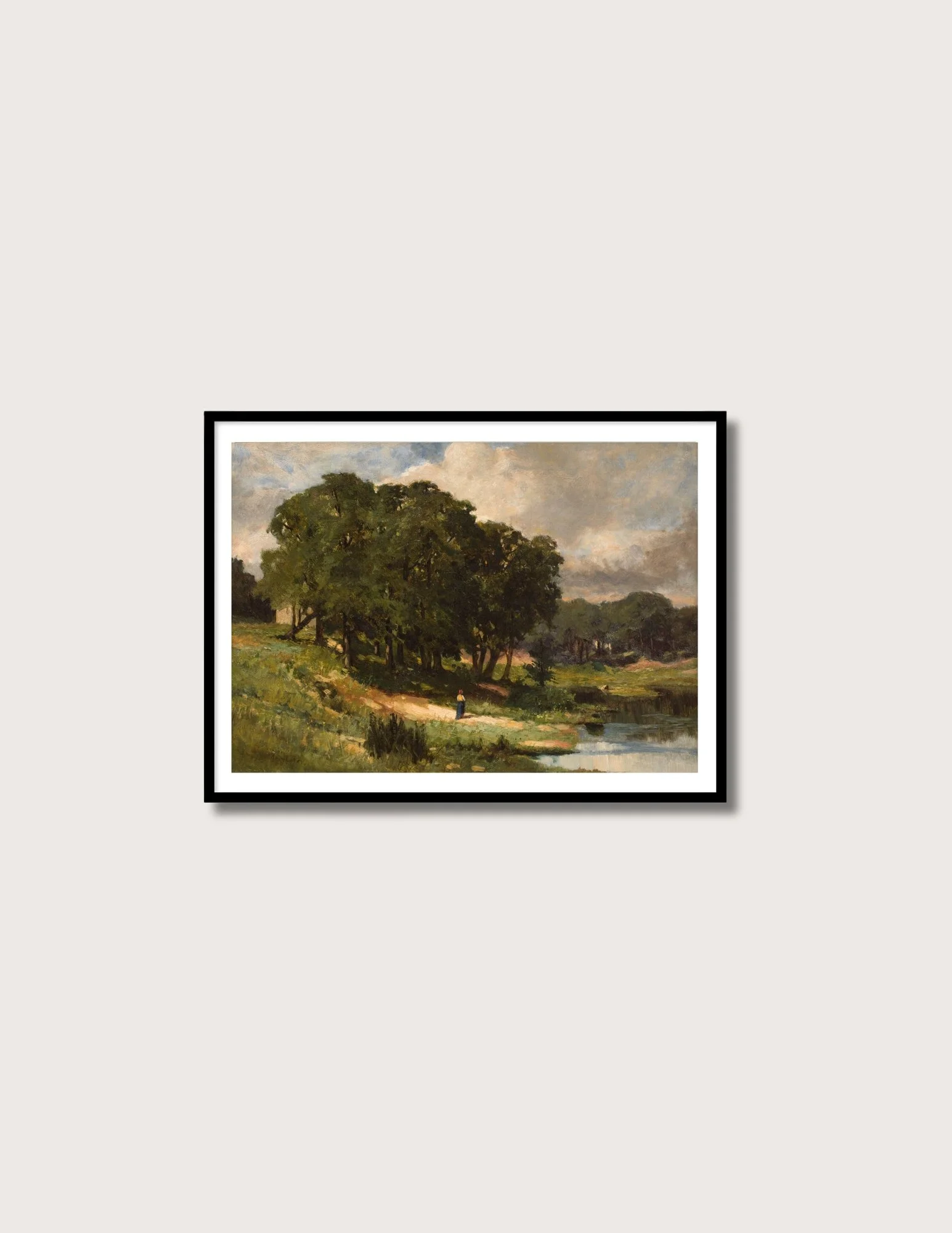 woman standing near pond_black frame.jpg