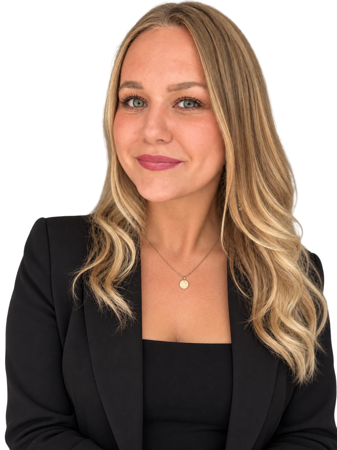 portrait of a woman with long blonde hair, blue eyes, wearing a black blazer and a round pendant necklace, smiling softly.
