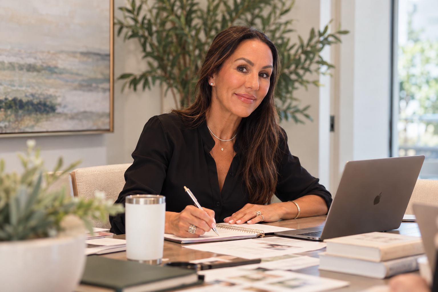 Sara Starkoff Green working at her office desk