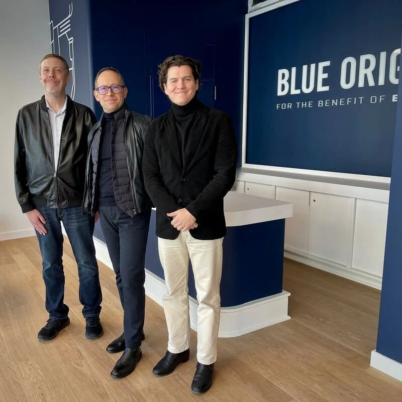 Richard and team in-front on Blue origin sign