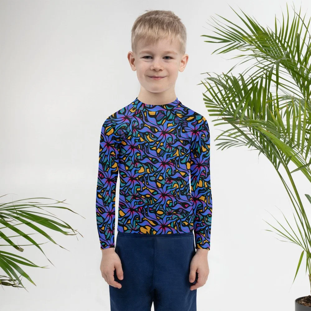 all-over-print-kids-rash-guard-white-front-68bf317e2d97e.jpg