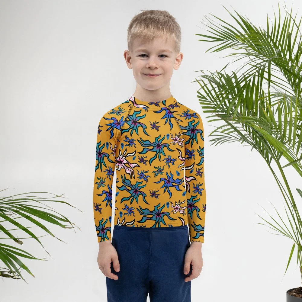 all-over-print-kids-rash-guard-white-front-6a062c4a0d714.jpg