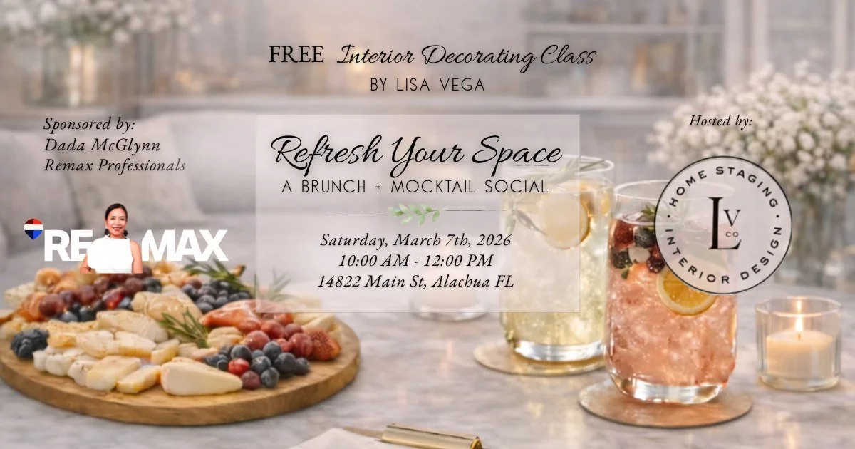 Flyer for a free interior decorating class titled 'Refresh Your Space' by Lisa Vega, scheduled for March 7th, 2026, at 14822 Main St, Alachua FL, hosted by Home Staging & Interior Design, sponsored by Dada McGlynn Remax Professionals. The flyer shows a cheese and fruit platter, glasses of sparkling beverages, a lit candle, and a blurred background of a bright indoor setting.