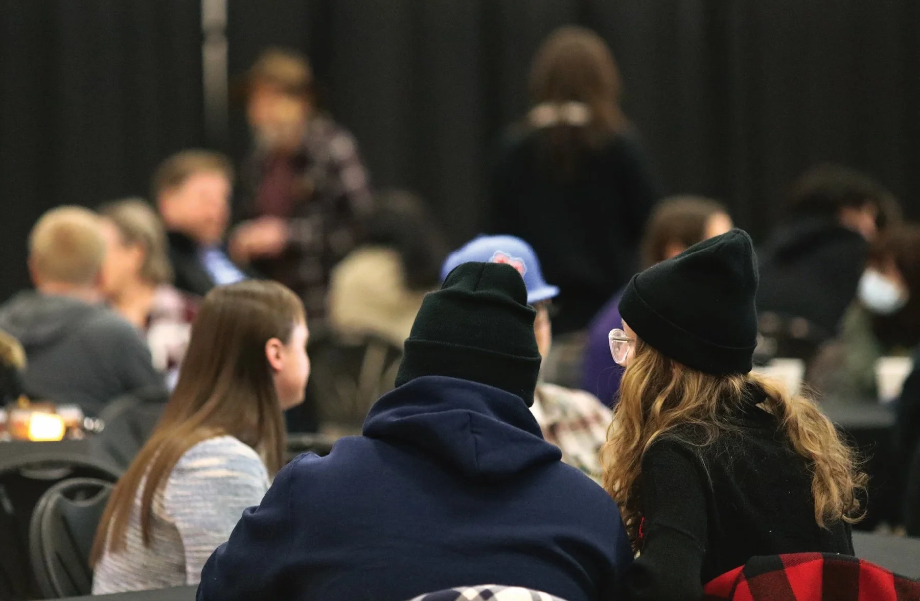 Students gathered in a cafeteria setting