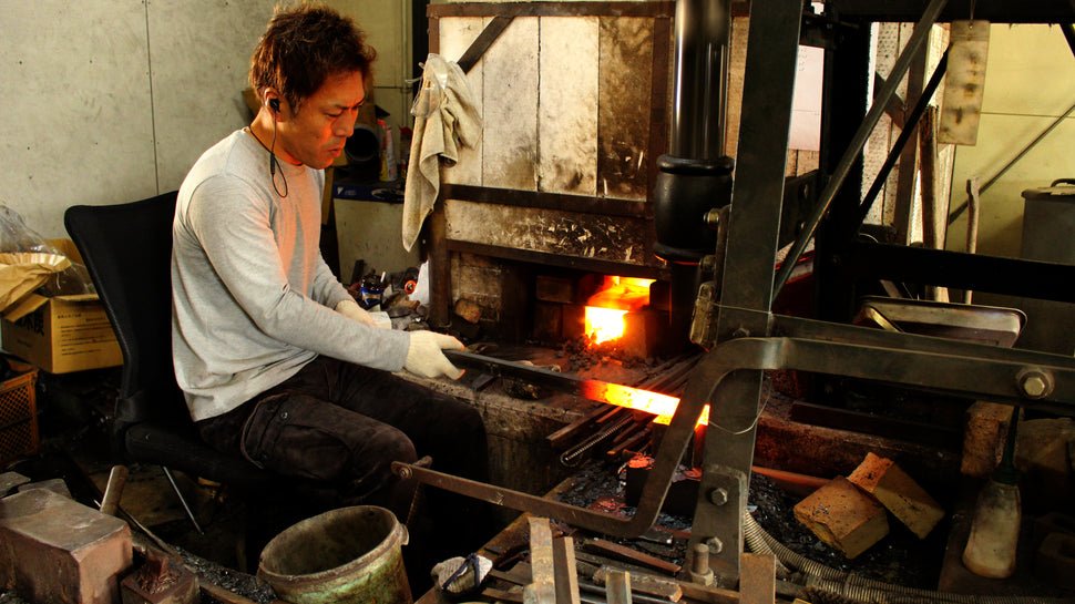 Image Of Blacksmith Expertly Forging Steel.