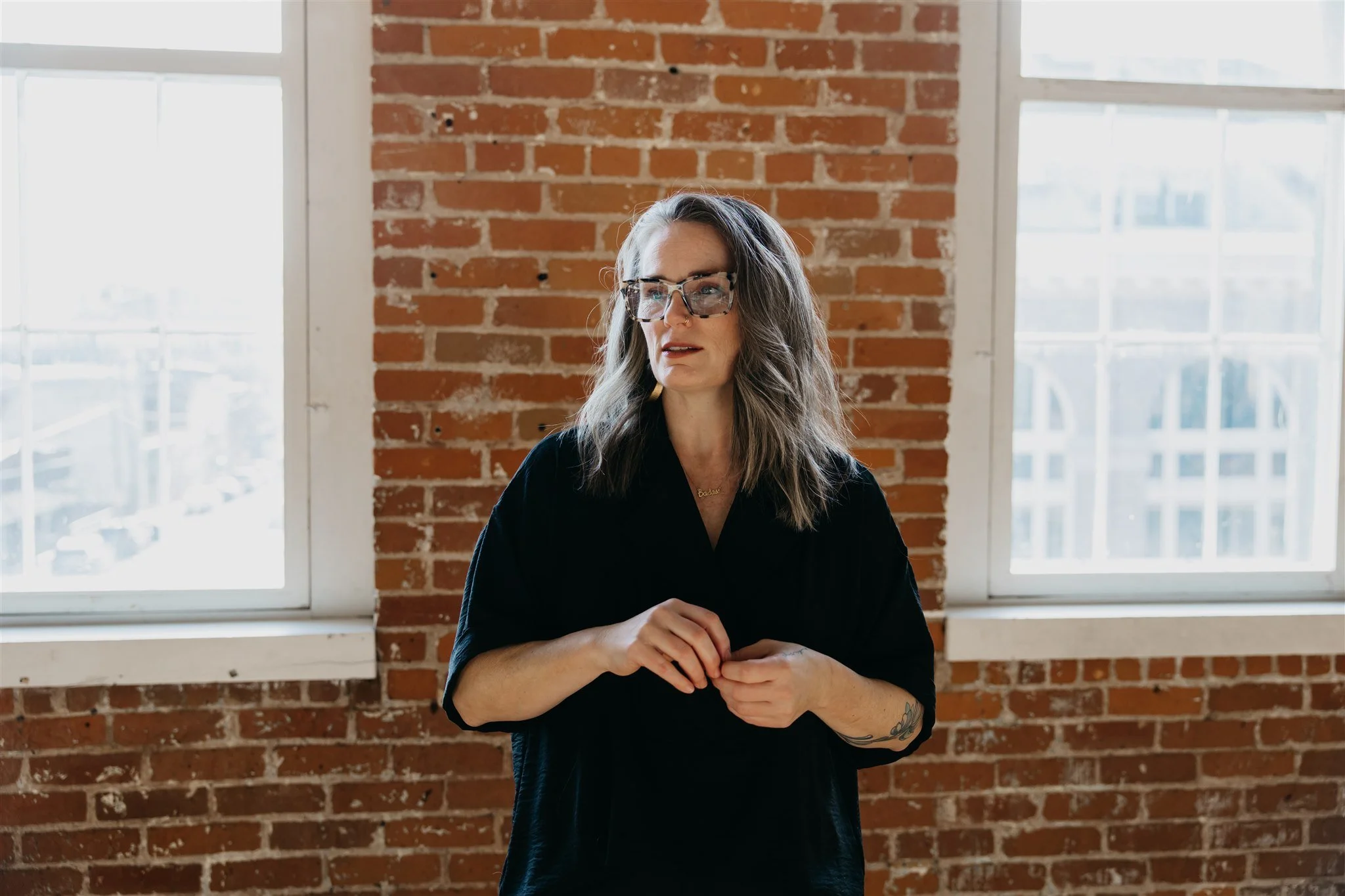 Sara speaking and educating with an engaging sense of humor.