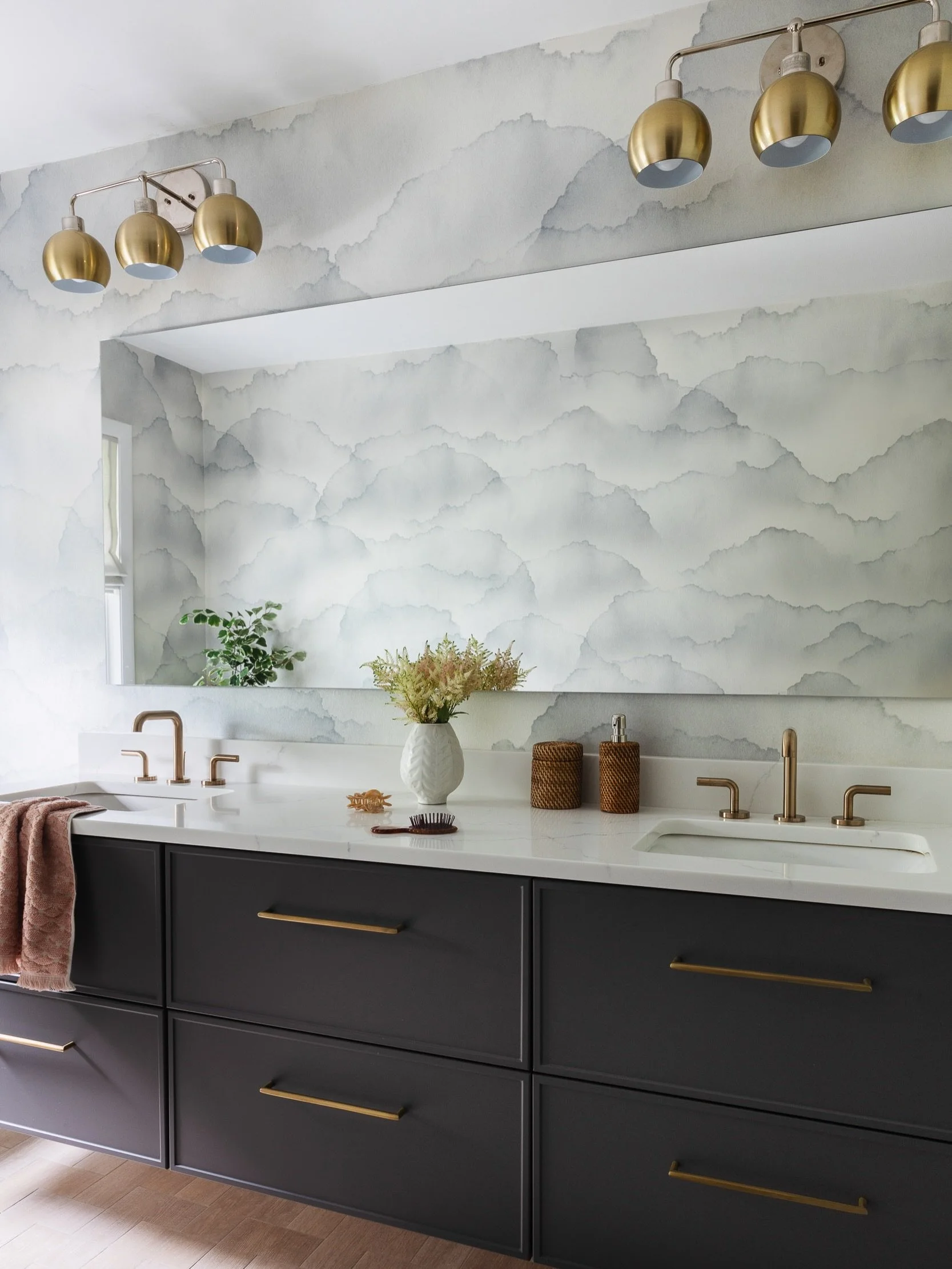 Dreamy, feminine, light &amp; airy. Think we hit the goal. @emmahayestextiles lovely wallpaper created the perfect atmosphere. Swipe for what we transformed.✨
Photo: @sarahecrowley 
.
.
.
#bathroomglowup #bathroomreno #housebeautiful #housebeautifulh