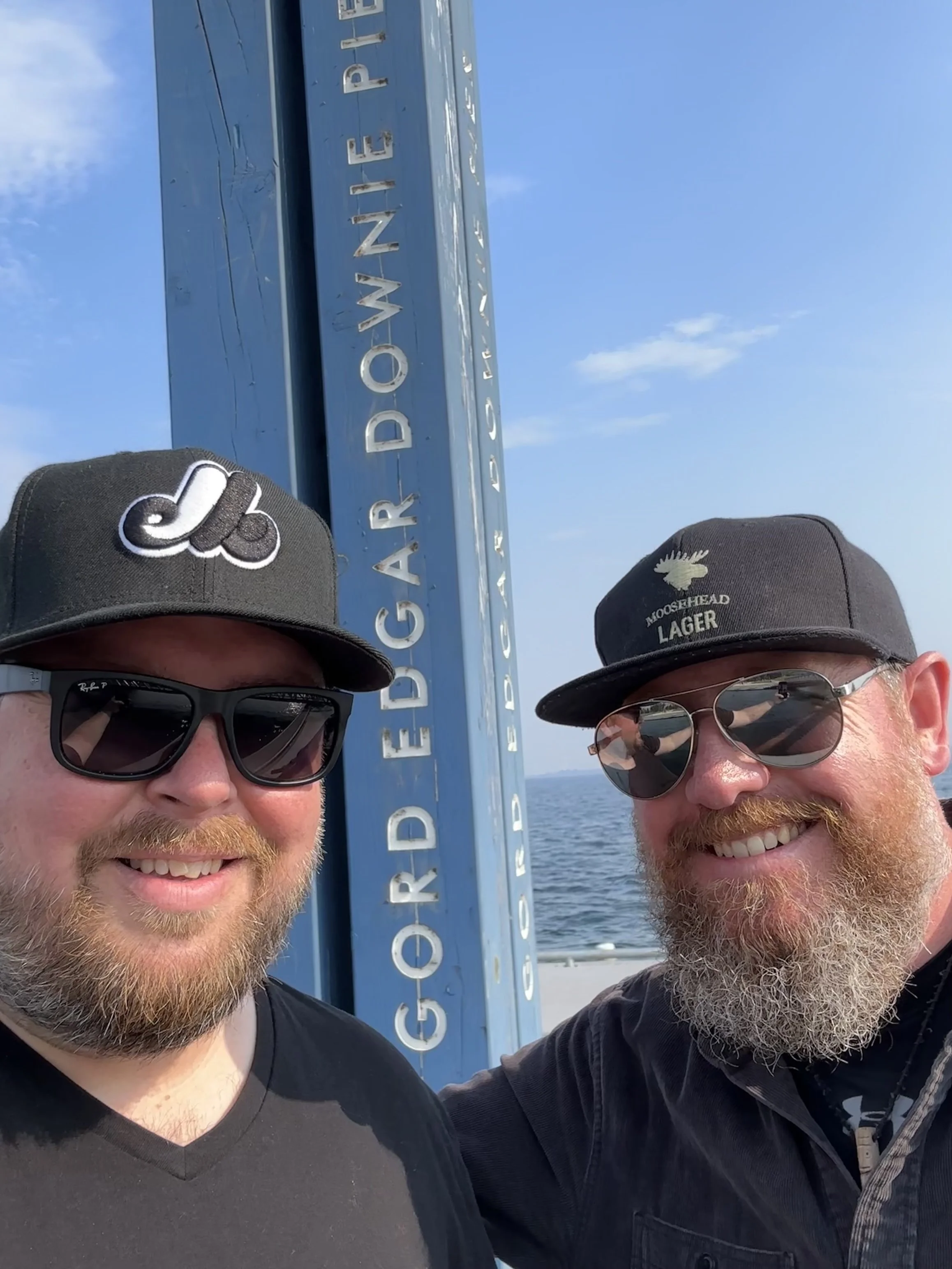 Greg and TJ from The Fabulously Rich: The Tragically Hip Tribute standing on Gord Downie Pier in Kingston, Ontario, Canada - Home of The Tragically Hip.