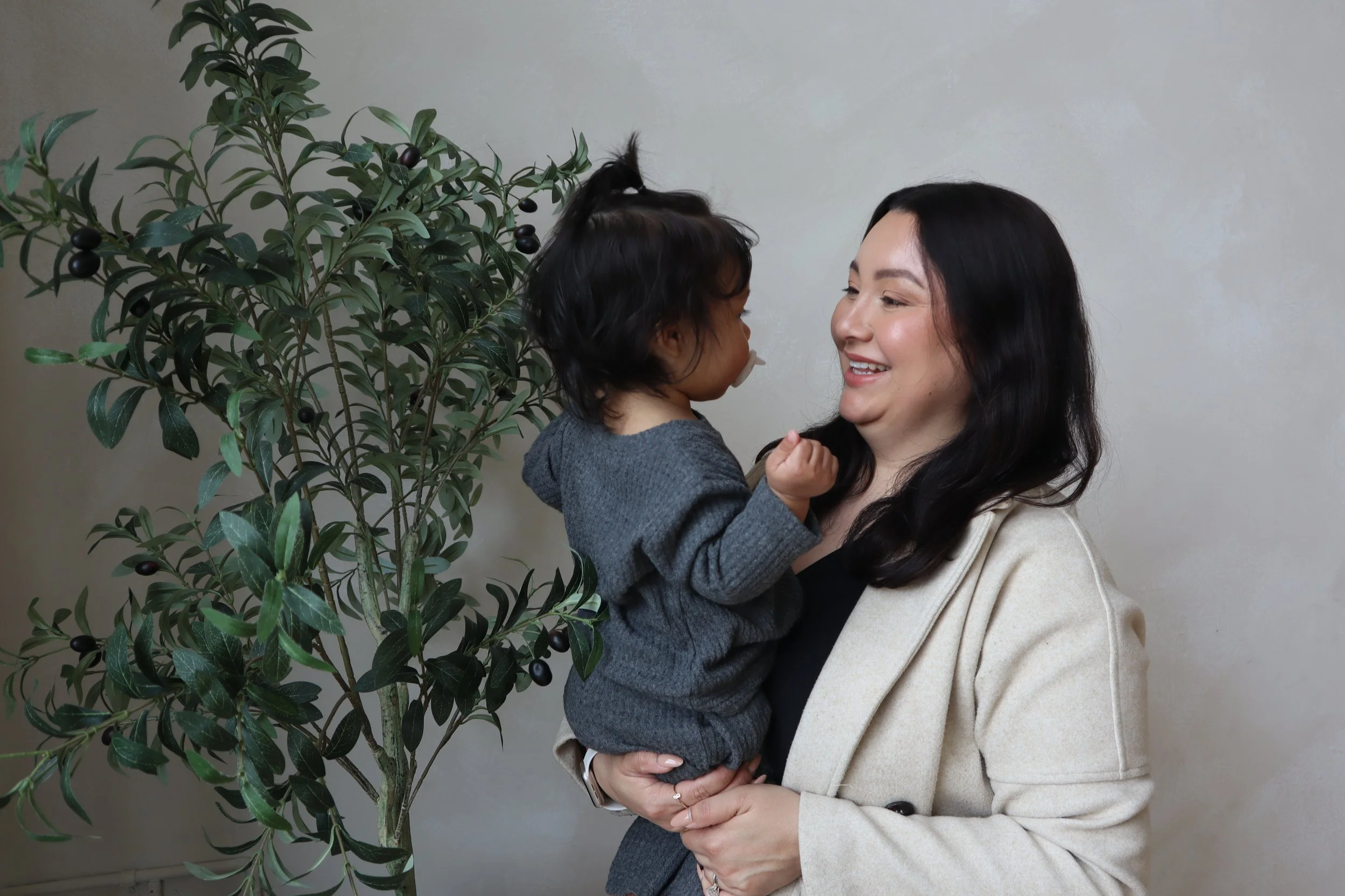 Paulina Roe and her daughter smiling at each other