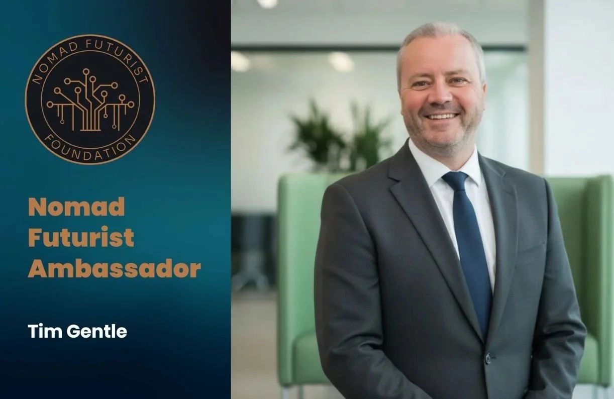Australian IT Services CEO Tim Gentle wearing a suit next to the text "Nomad Futurist Ambassador"