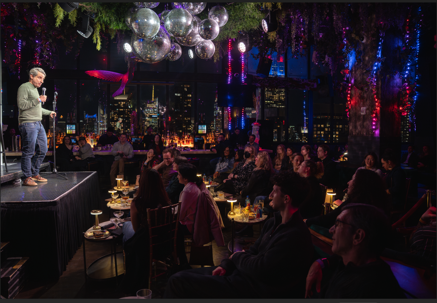 Comedian at a live comedy show produced by Rethink Production