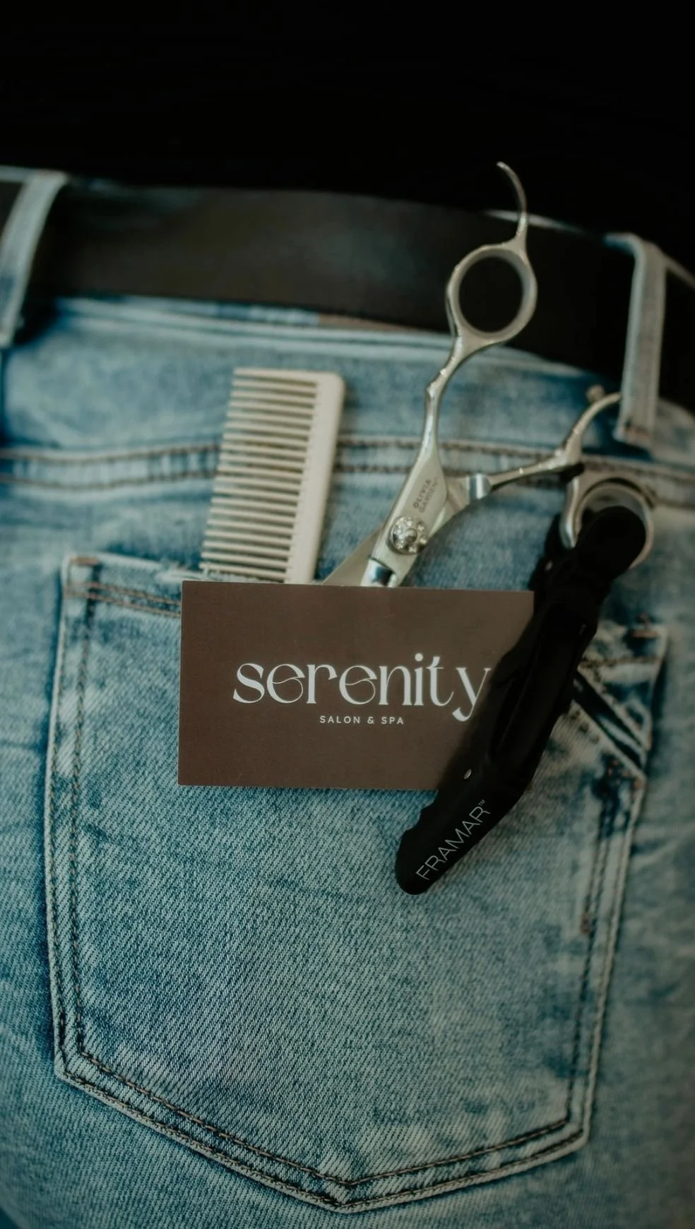 Salon tools with a card reading 'serenity'.