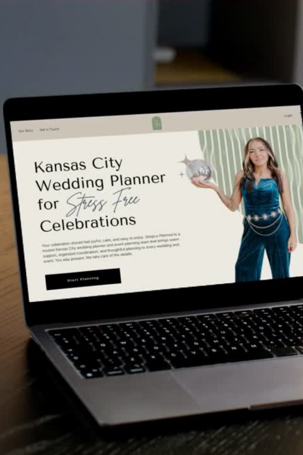 Laptop screen displaying a website for a Kansas City wedding planner for stress-free celebrations, featuring a woman in a blue dress holding a globe