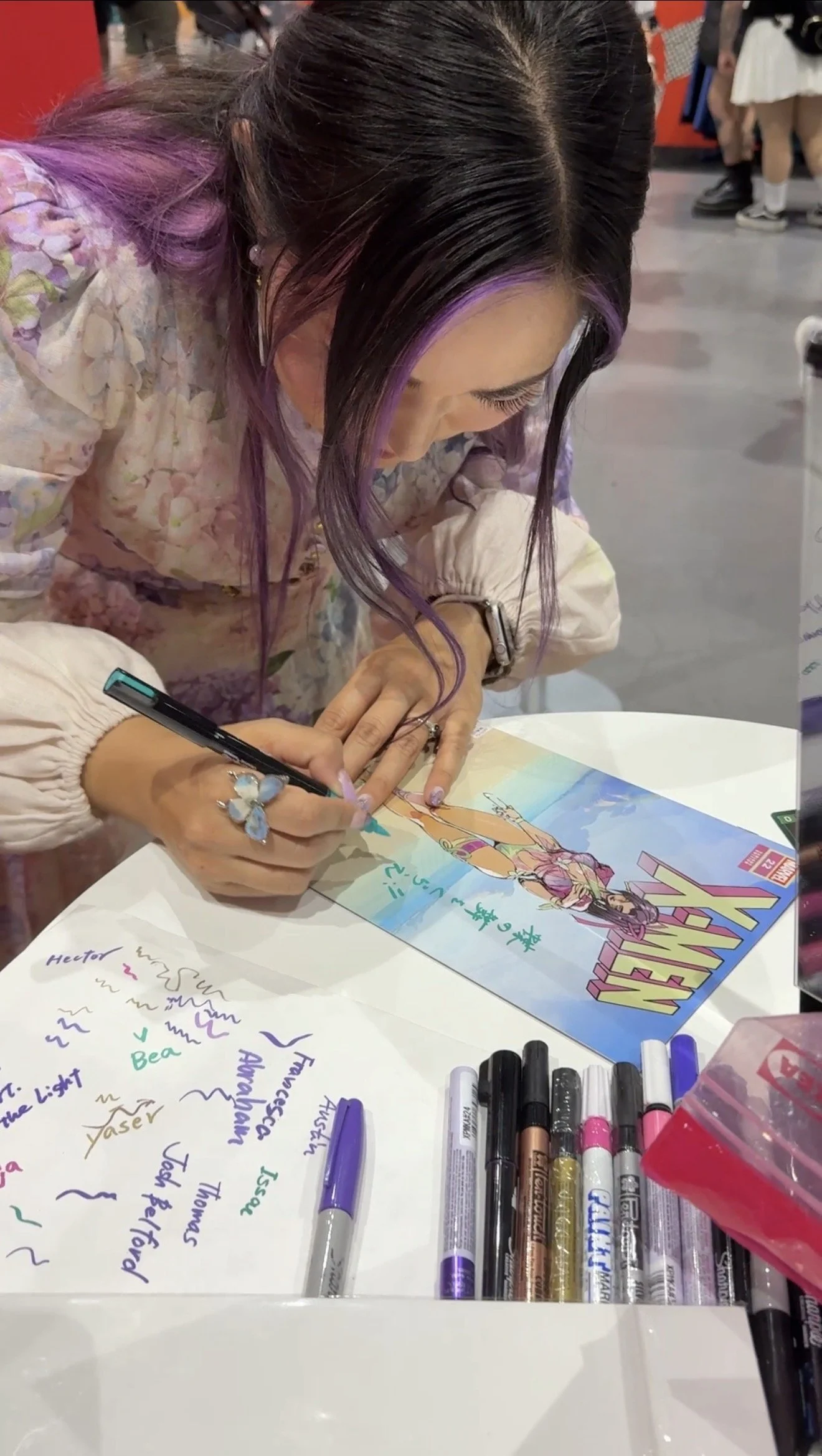 Alpha Takahashi, who voices Psylocke in Marvel Rivals, can autograph prints and comic books.