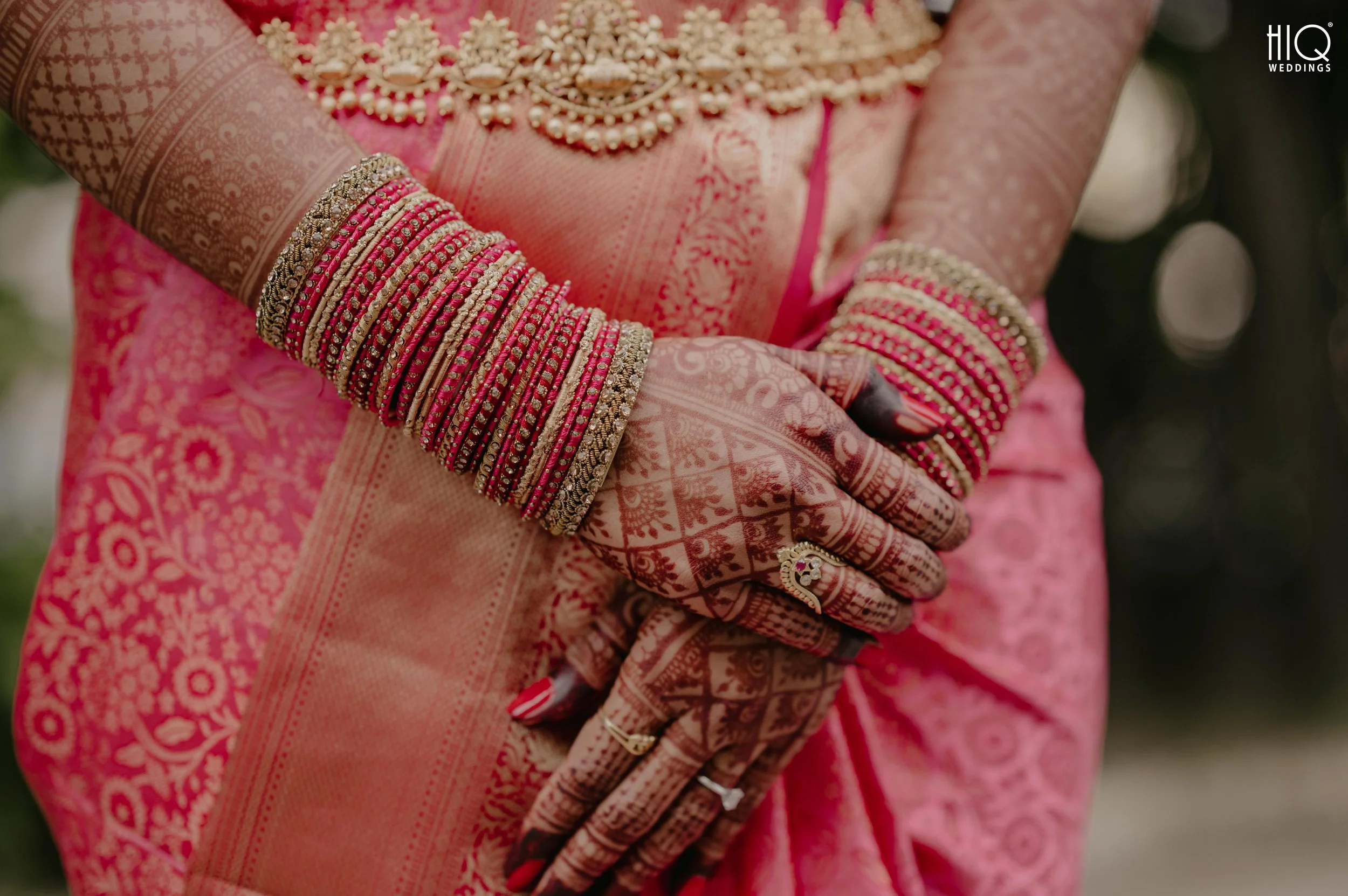 Close-up of Mehndi and bridal bangles