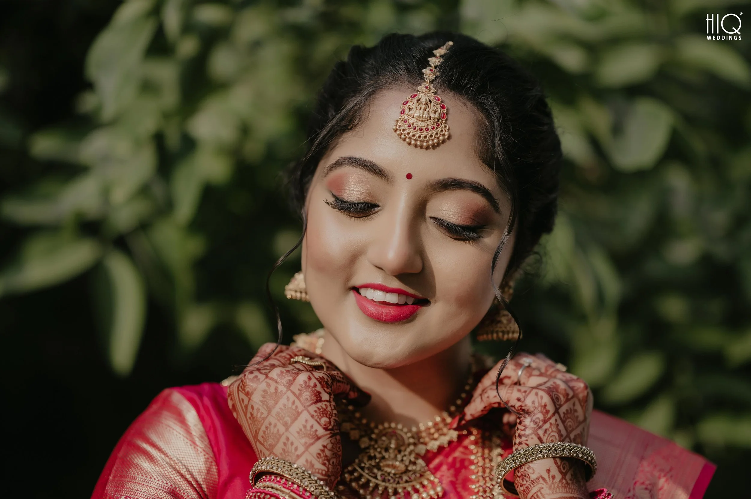 Close-up shot of bride with her elegant bridal jewelry captured