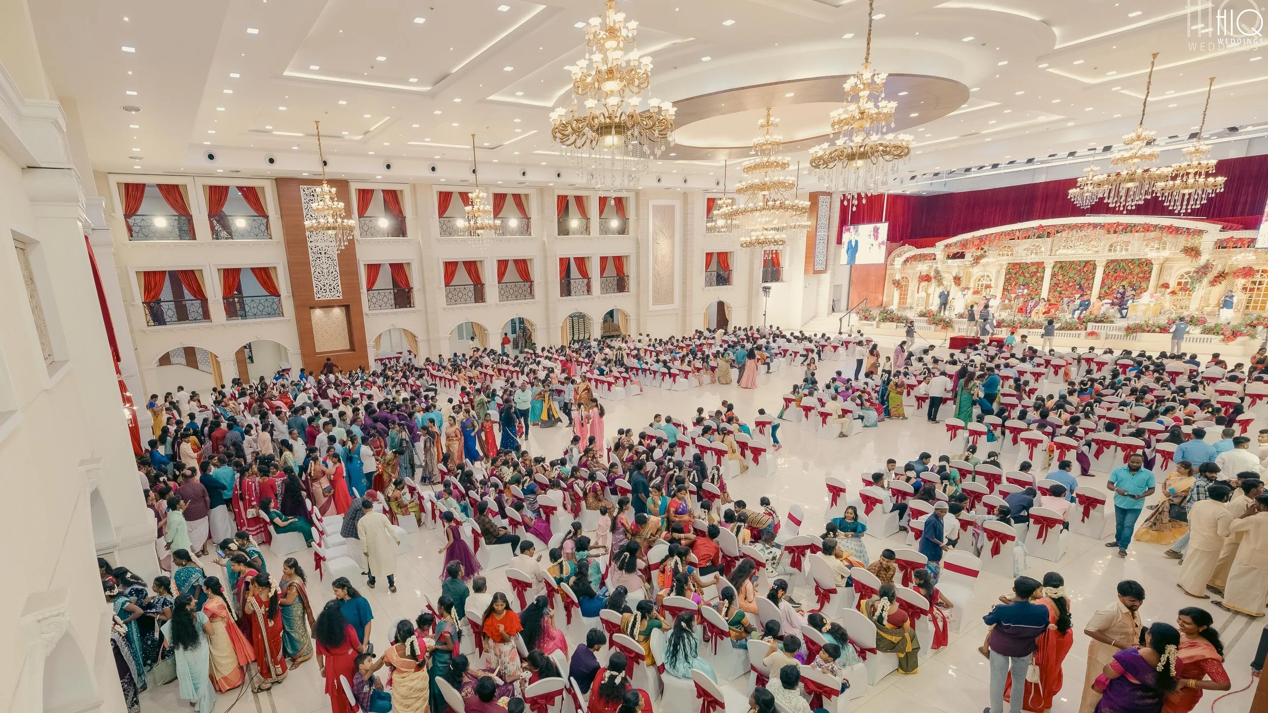 GPN Palace Chennai - Large wedding hall for reception with crowd celebrating.
