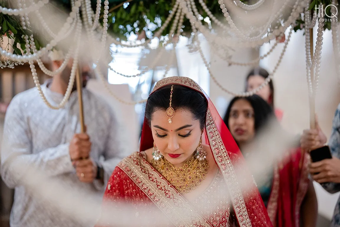 Gorgeous HiQ Bride Rachna clicked by HiQ Weddings as she is making her entry at her wedding 